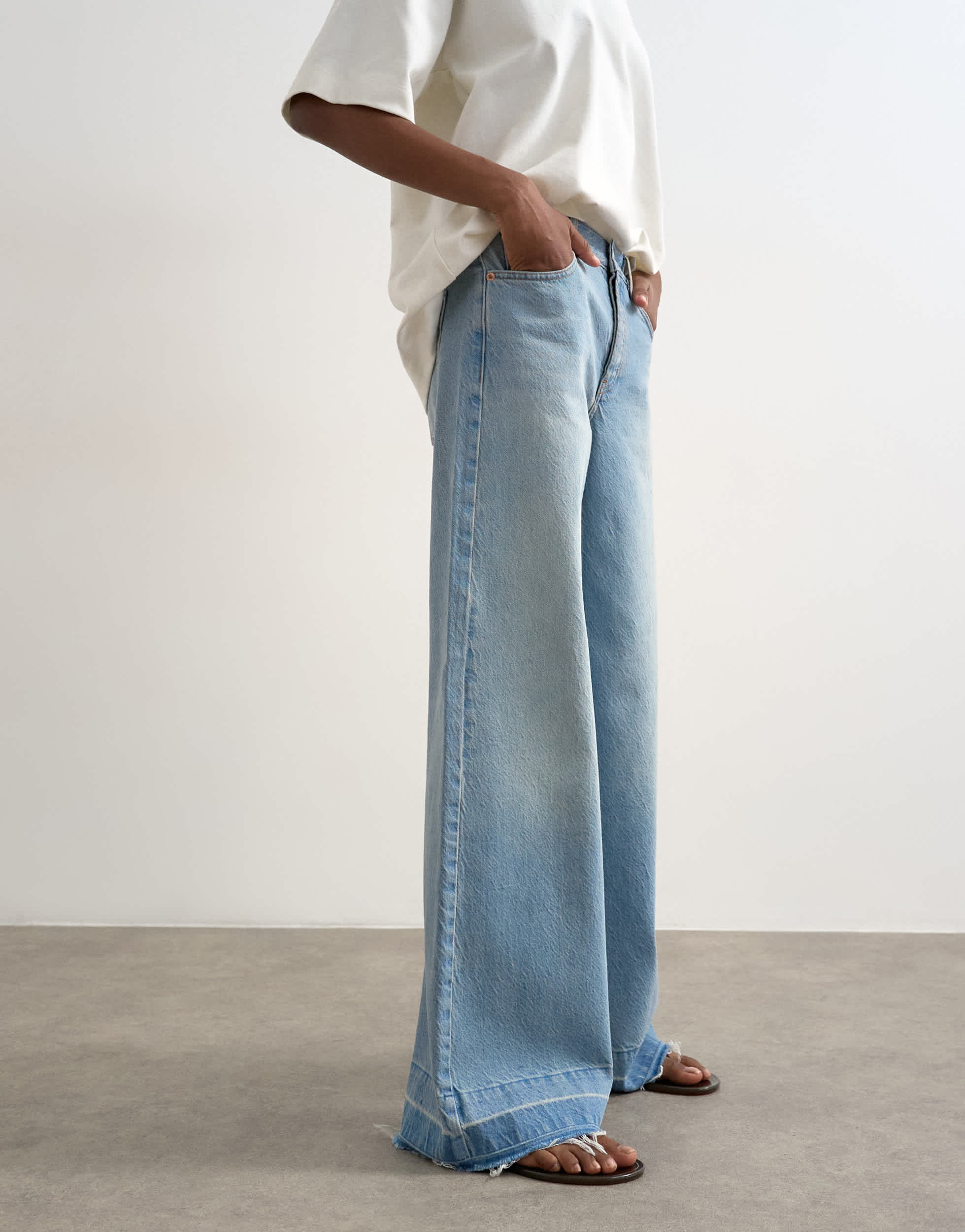 Topshop Horizon mid rise wide leg jean with let down hem detail in vintage blue