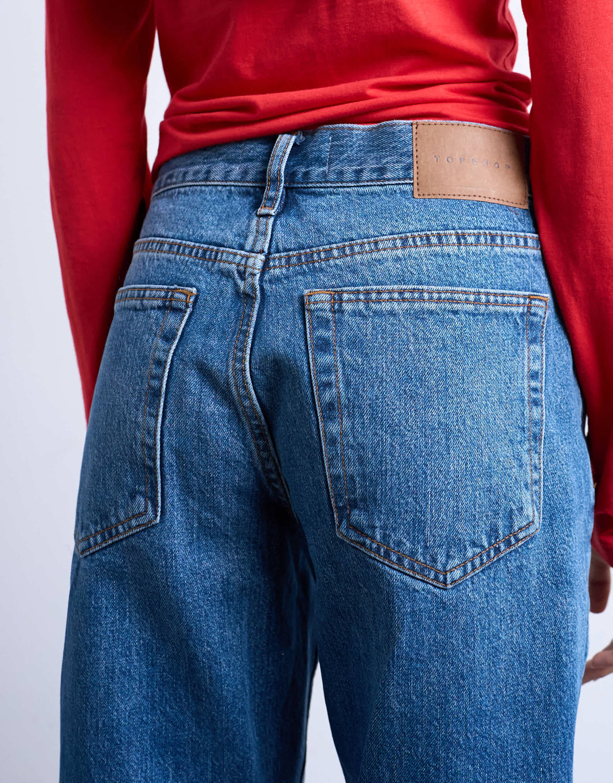 Topshop Runway mid rise straight cropped jean with let down hem detail in vintage blue