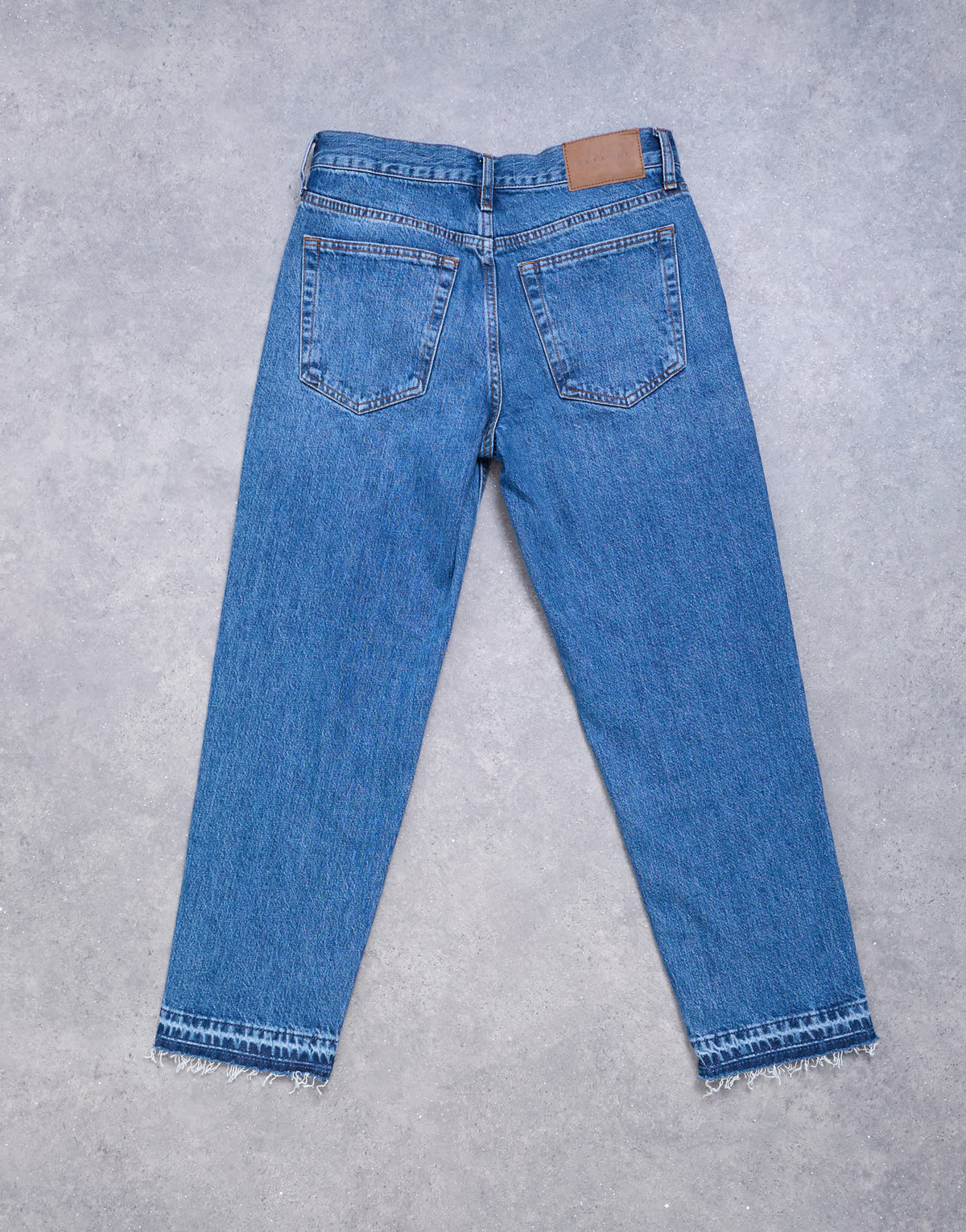 Topshop Runway mid rise straight cropped jean with let down hem detail in vintage blue