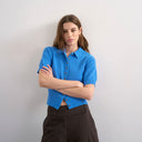 Polo Topshop en maille éponge fine, taille cintrée, bleu