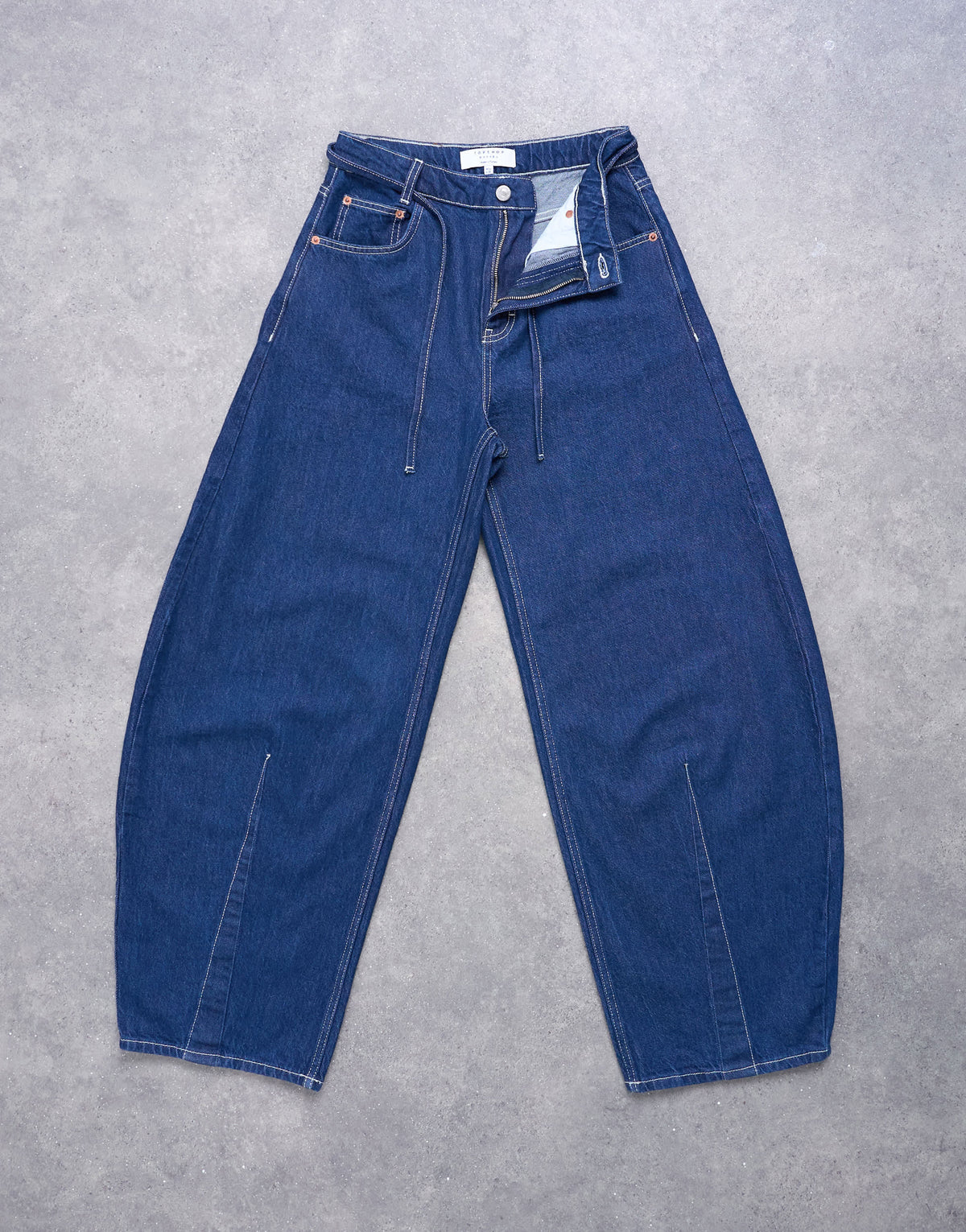 Topshop extreme barrel mid rise jean with belt detail in indigo rinse