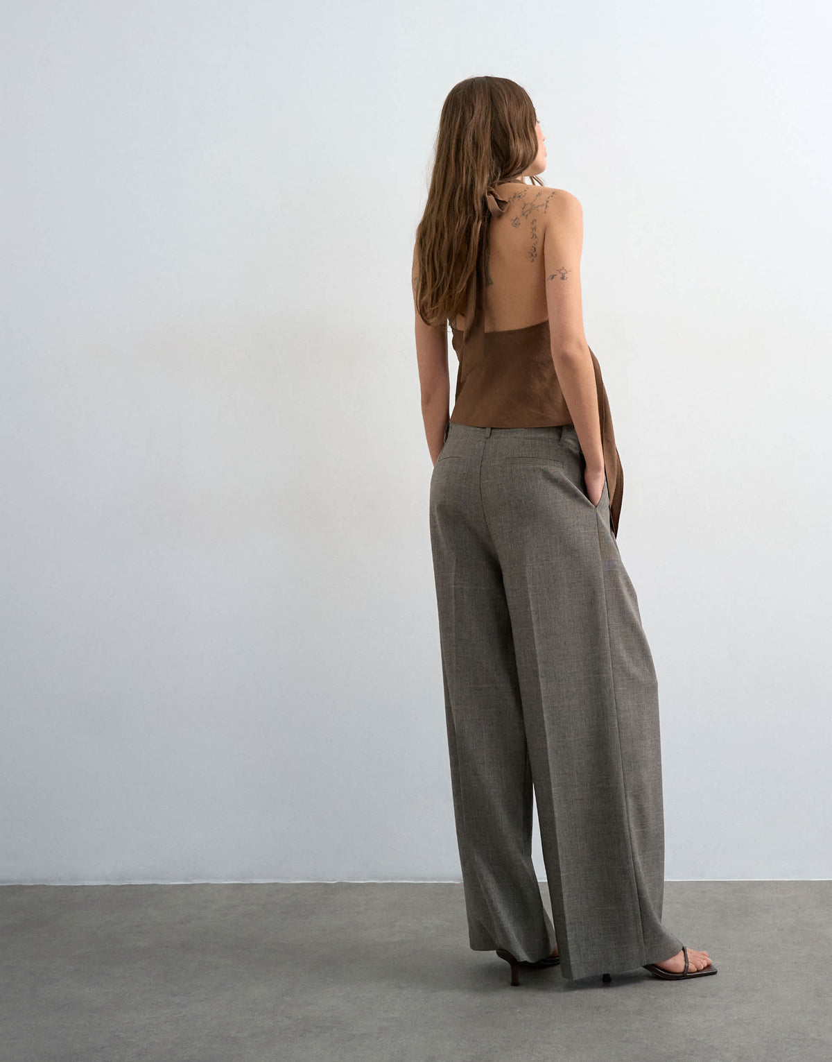 Topshop raw hem low slung double pleated tailored trouser in brown marl