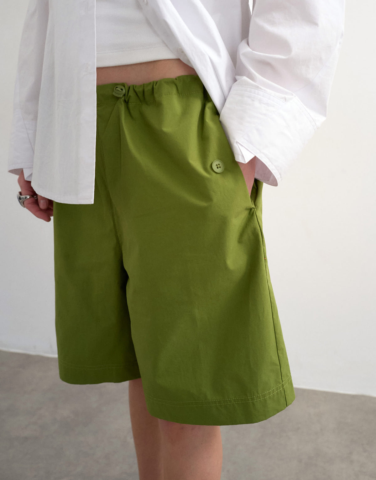 Topshop longline cargo short with bungee cords in green