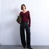 Topshop Hose mit tiefer Taille und grauem Fischgrätmuster.