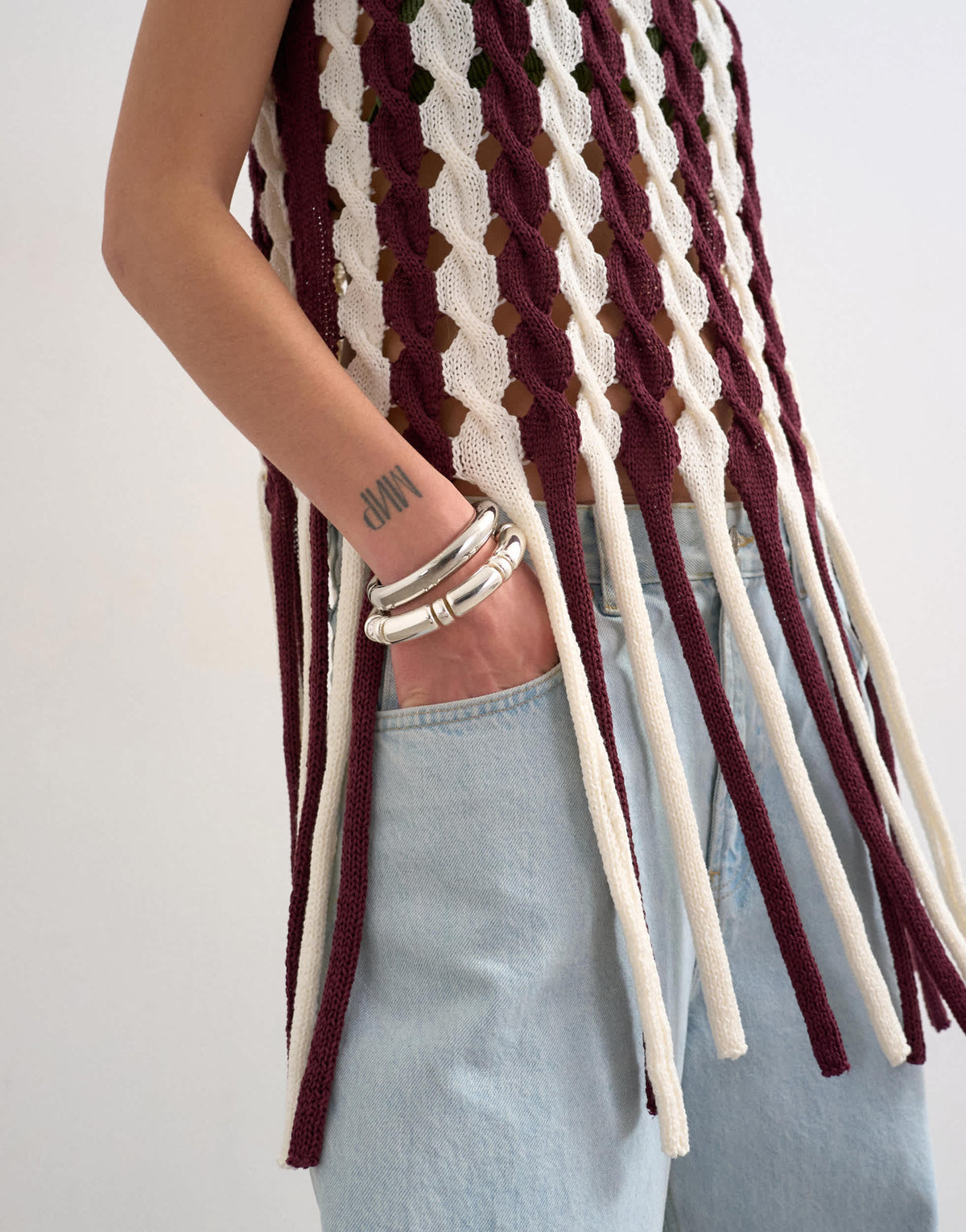 Topshop knitted sleeveless longline knit top with tassel fringe hem in burgundy