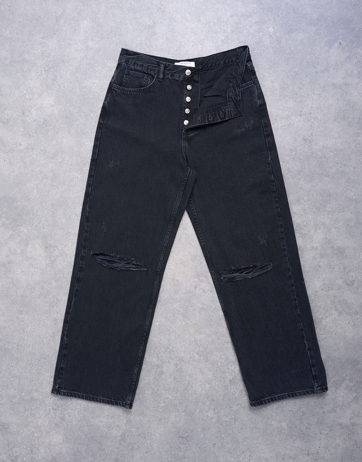 Topshop Column mid rise jean with rip in washed black