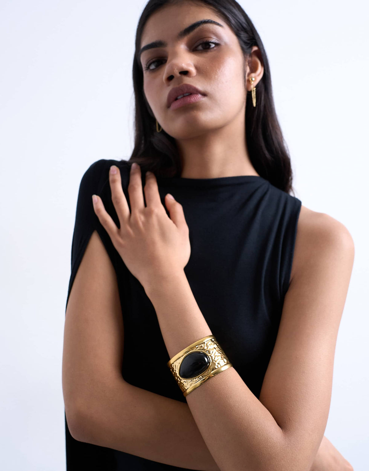 Topshop Blossom stainless steel bangle with black stone in gold