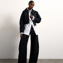 Jean taille haute Tolu Coker x Topshop, coupe ronde, délavage indigo