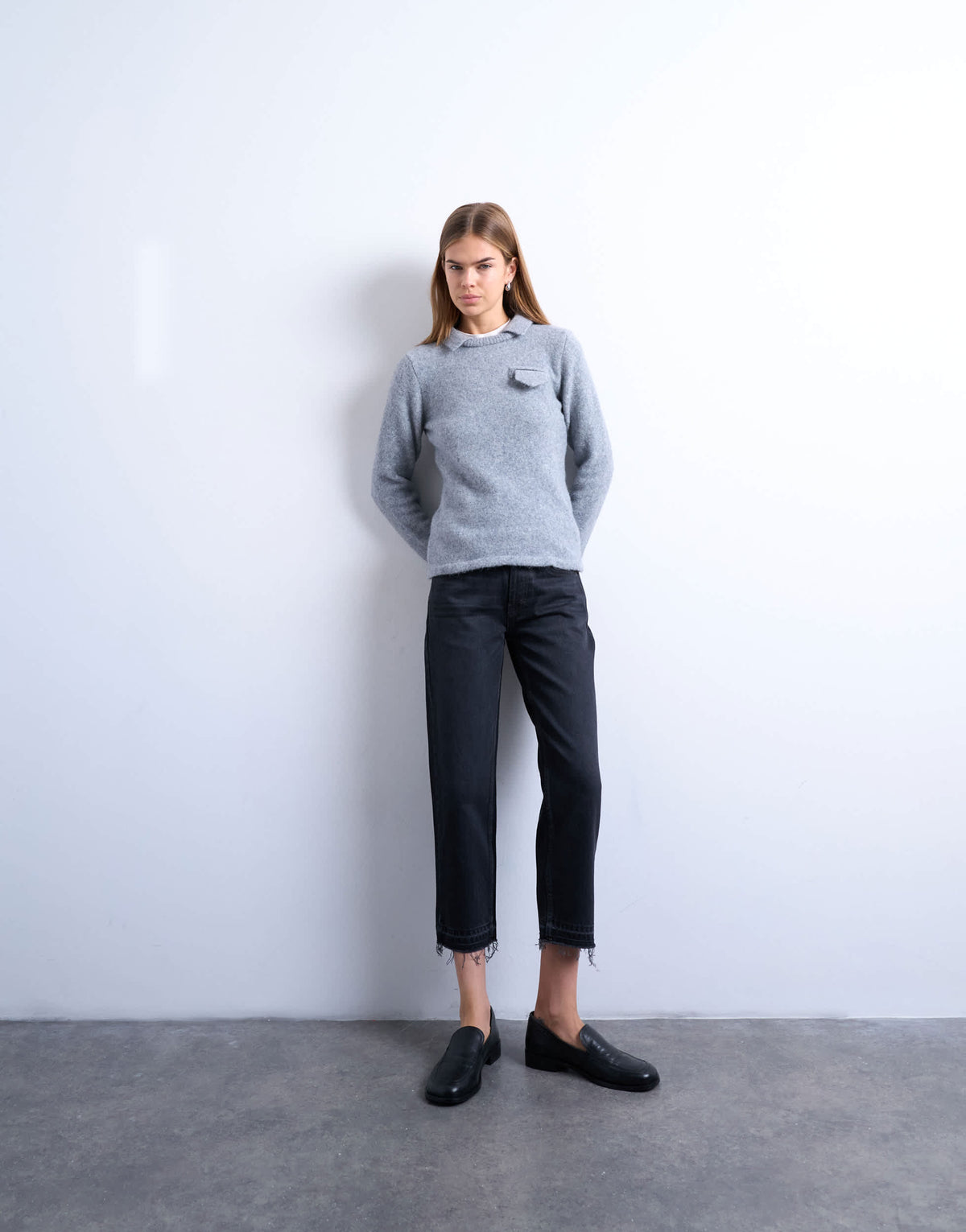Topshop Runway mid rise straight cropped jean with let down hem detail in washed black