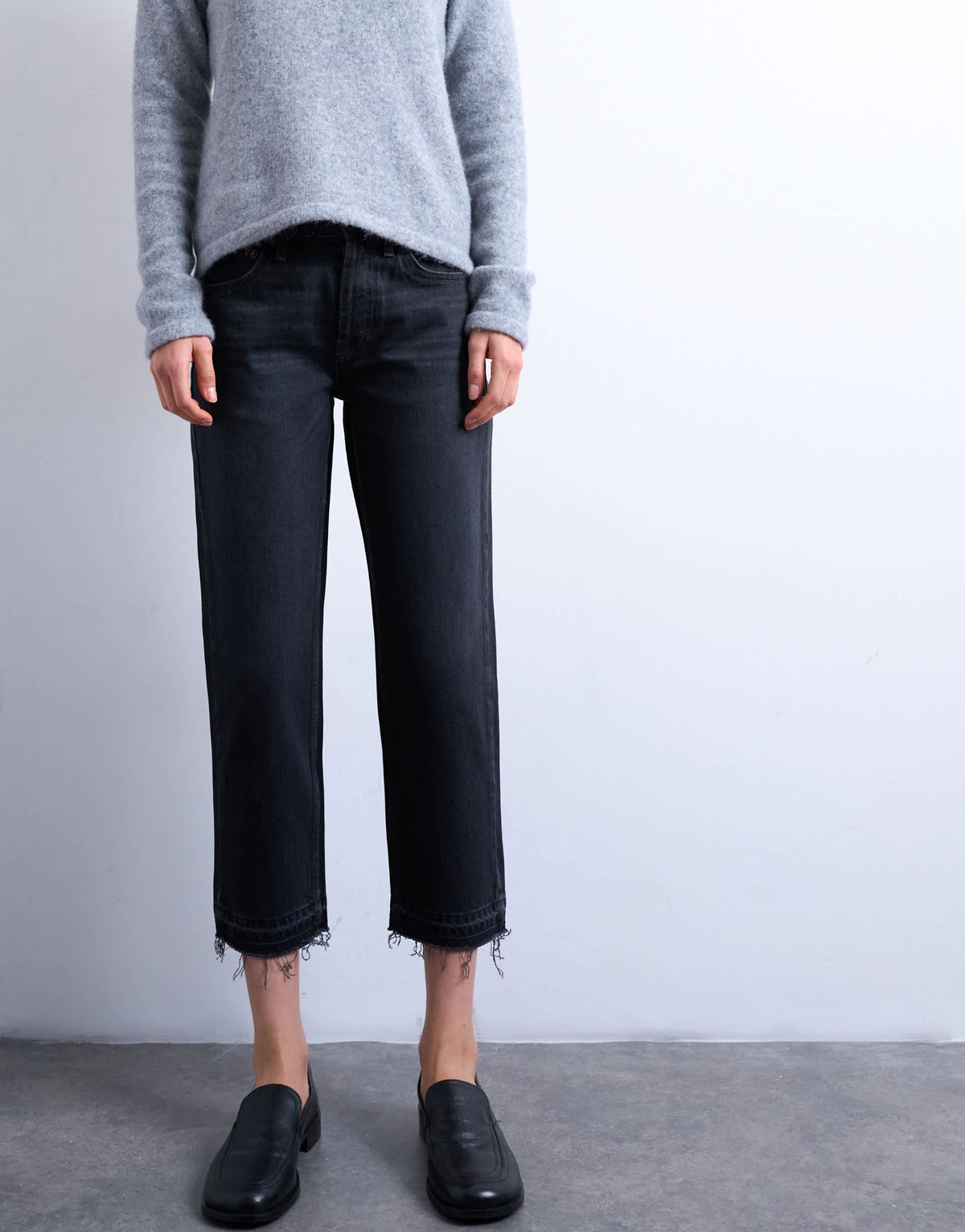 Topshop Runway mid rise straight cropped jean with let down hem detail in washed black