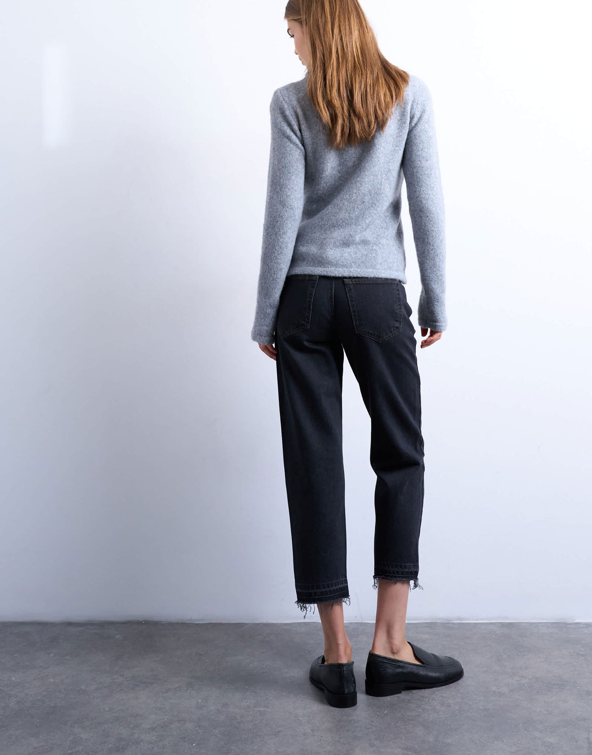Topshop Runway mid rise straight cropped jean with let down hem detail in washed black