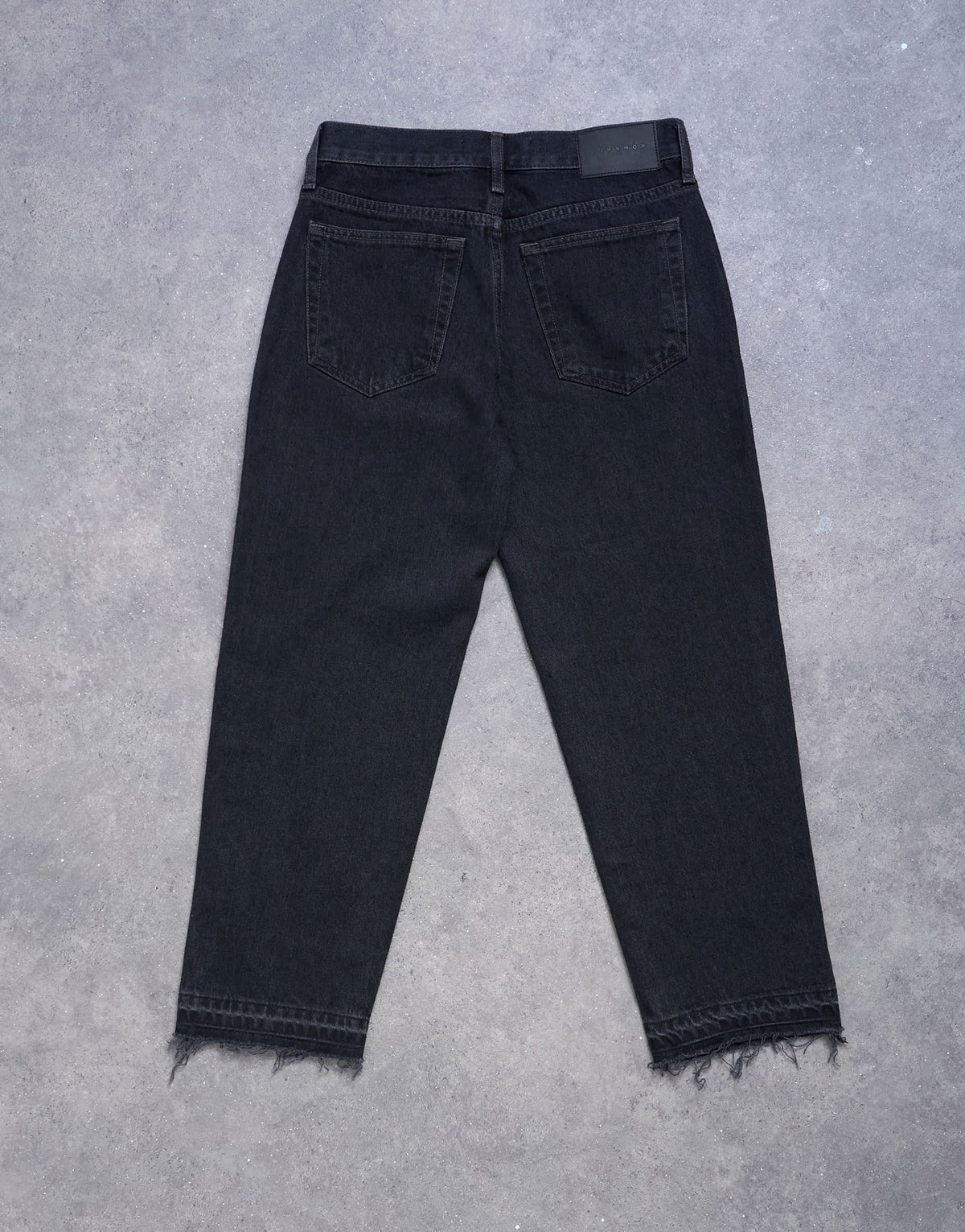 Topshop Runway mid rise straight cropped jean with let down hem detail in washed black