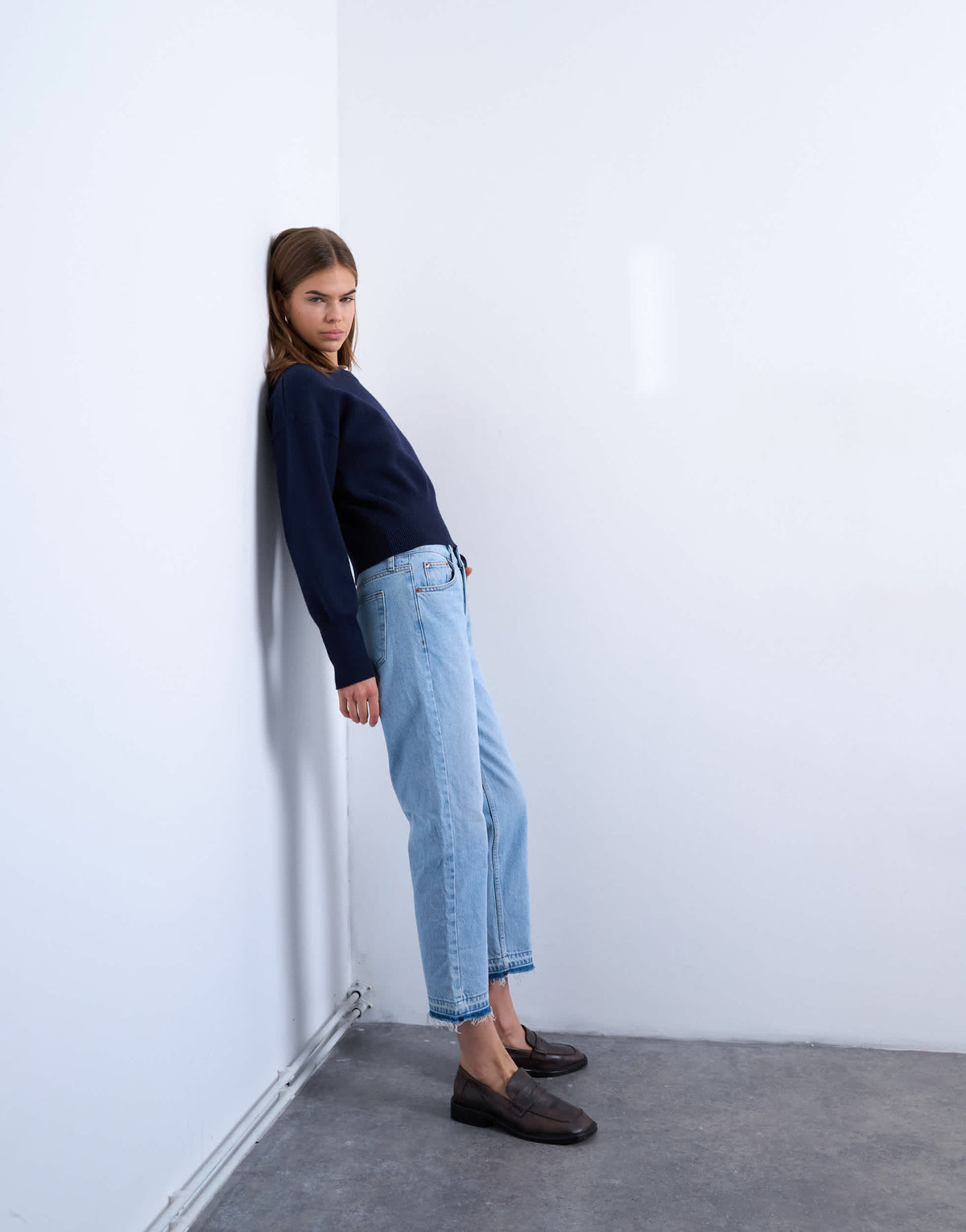 Topshop Runway mid rise straight cropped jean with let down hem detail in bleach