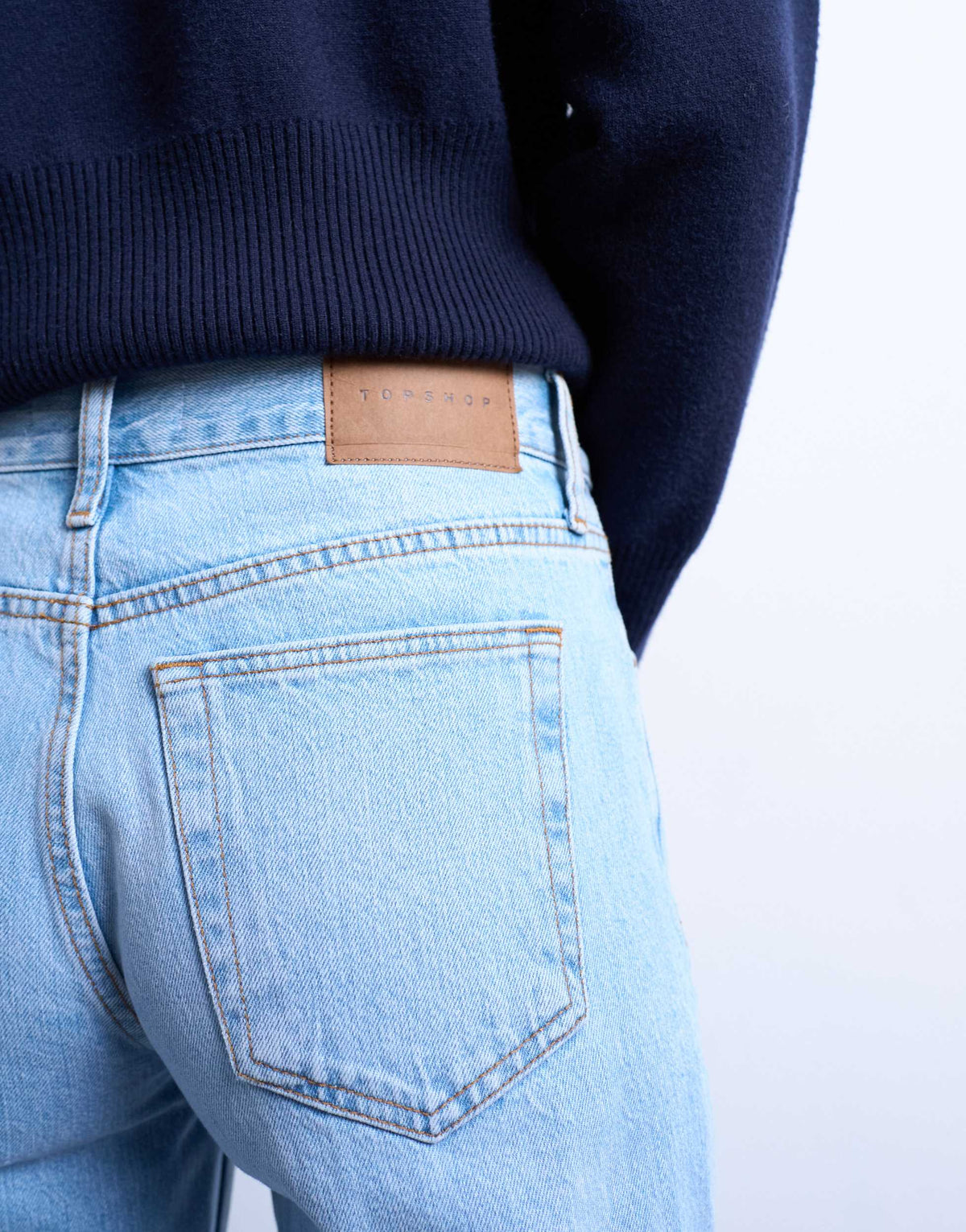 Topshop Runway mid rise straight cropped jean with let down hem detail in bleach