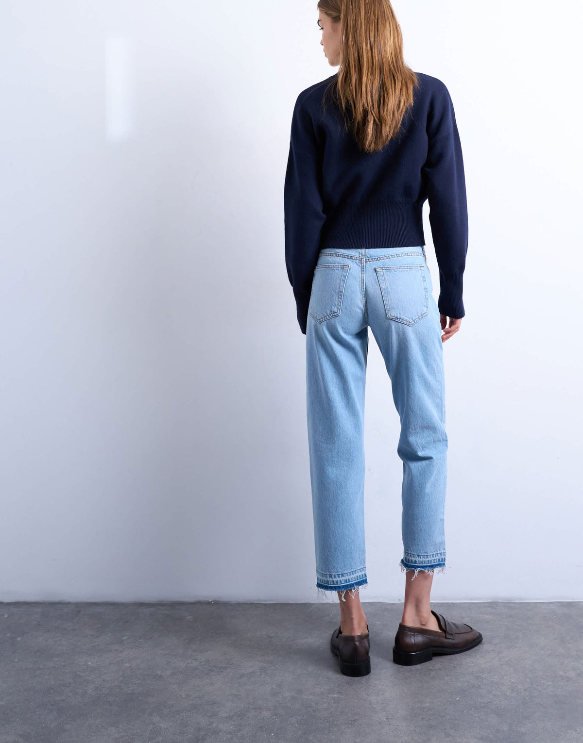 Topshop Runway mid rise straight cropped jean with let down hem detail in bleach