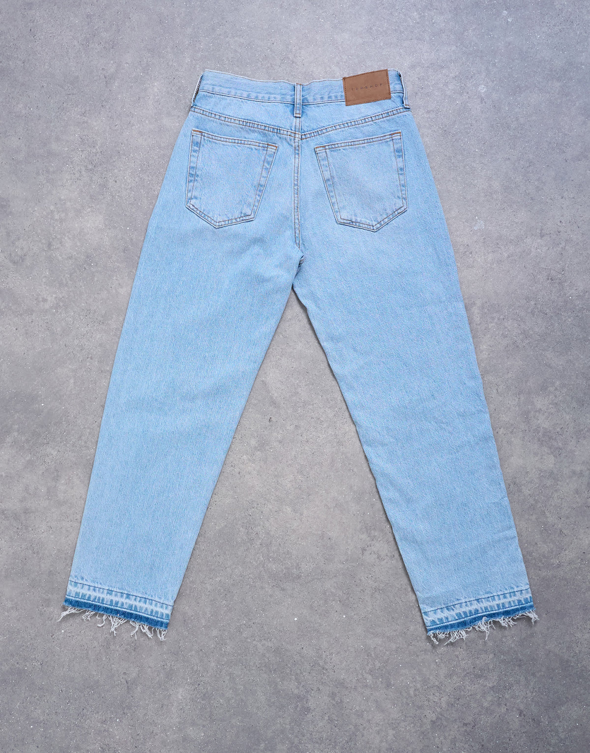 Topshop Runway mid rise straight cropped jean with let down hem detail in bleach