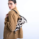 Topshop Siris buckle shoulder bag in cow print