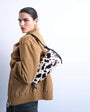 Topshop Siris medium buckle shoulder bag in cow print