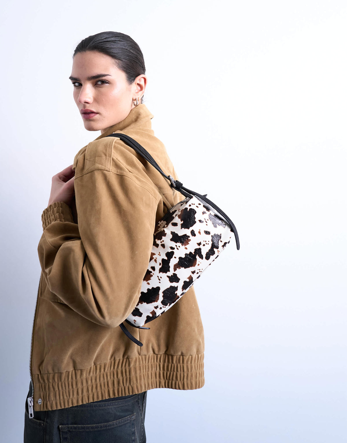 Topshop Siris medium buckle shoulder bag in cow print