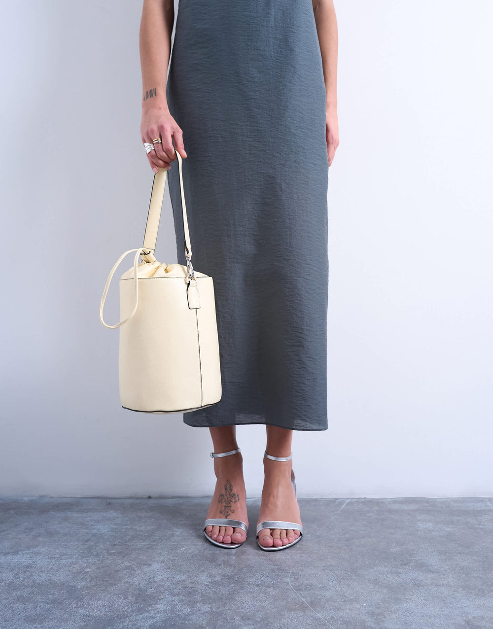 Topshop Carla large cross body bucket bag in buttermilk