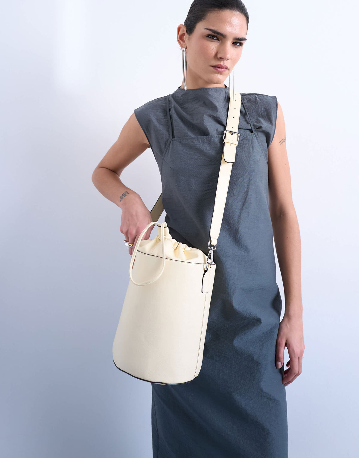 Topshop Carla large cross body bucket bag in buttermilk