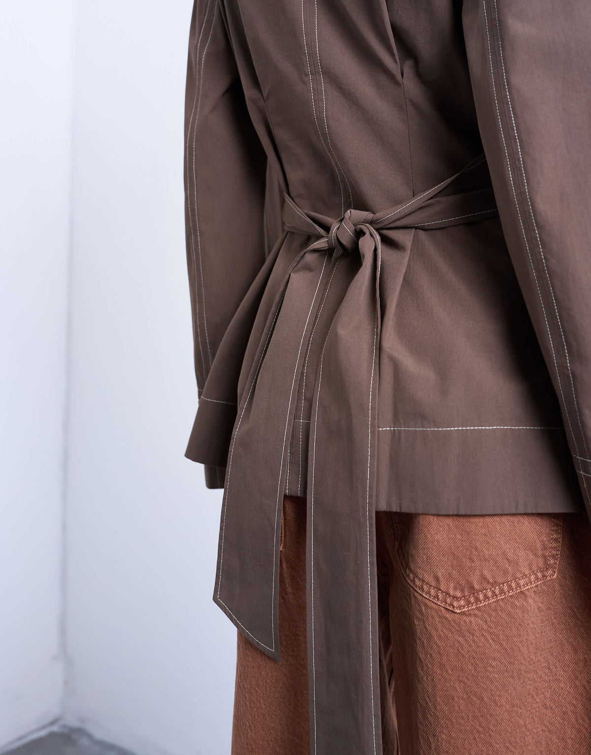 Topshop long sleeve tie waist top with contrast stich in brown