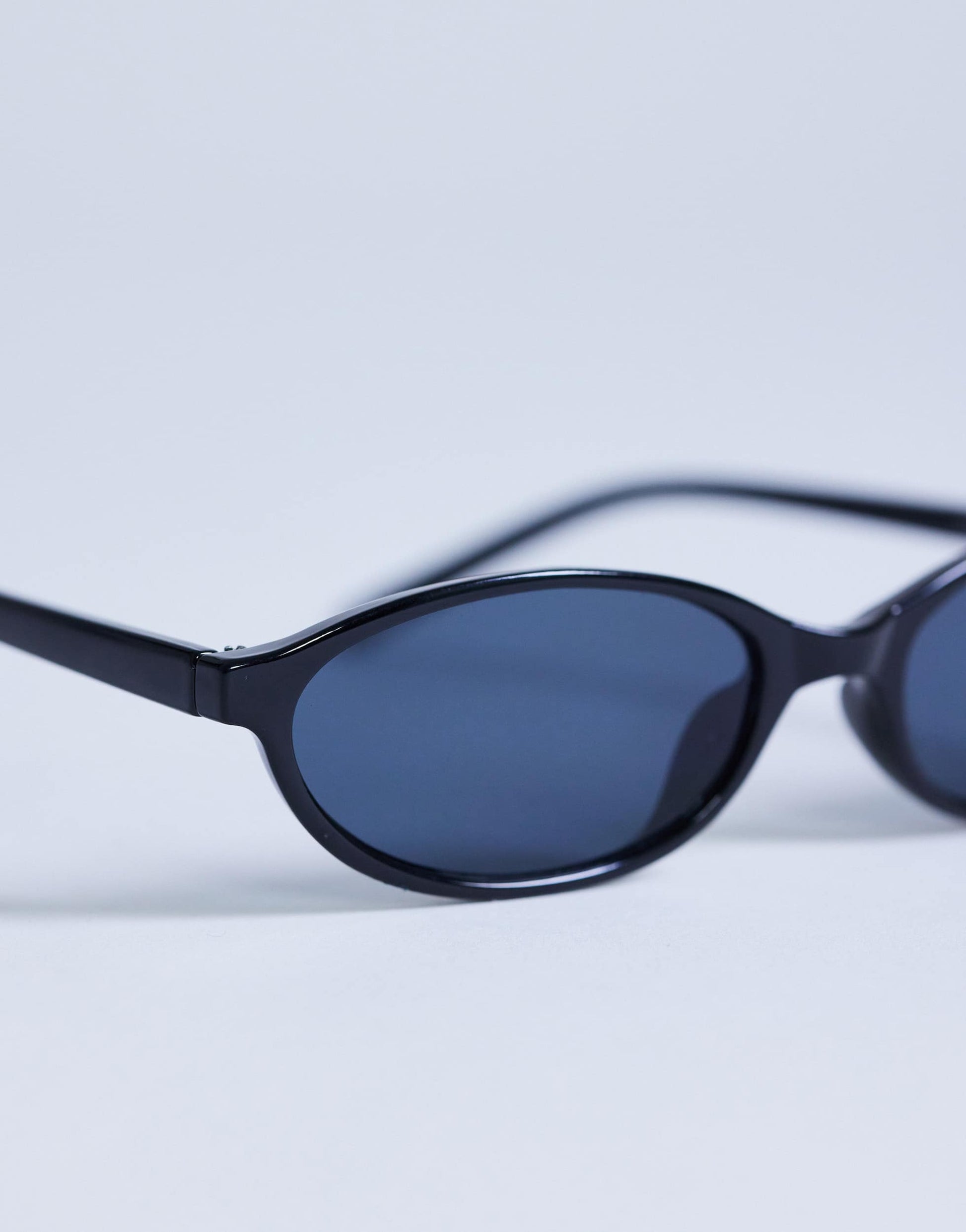 Topshop Lanzarote oval sunglasses in black
