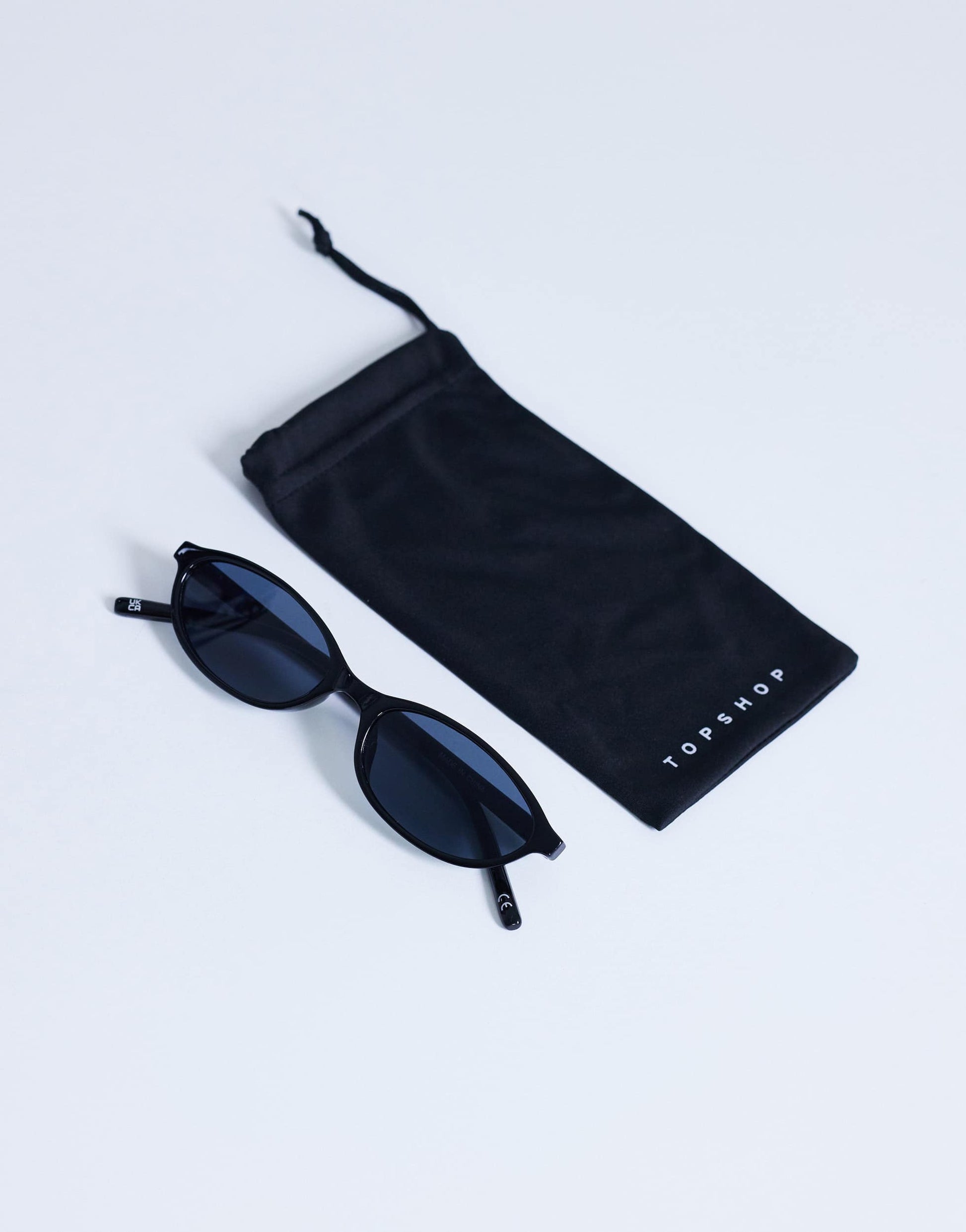 Topshop Lanzarote oval sunglasses in black