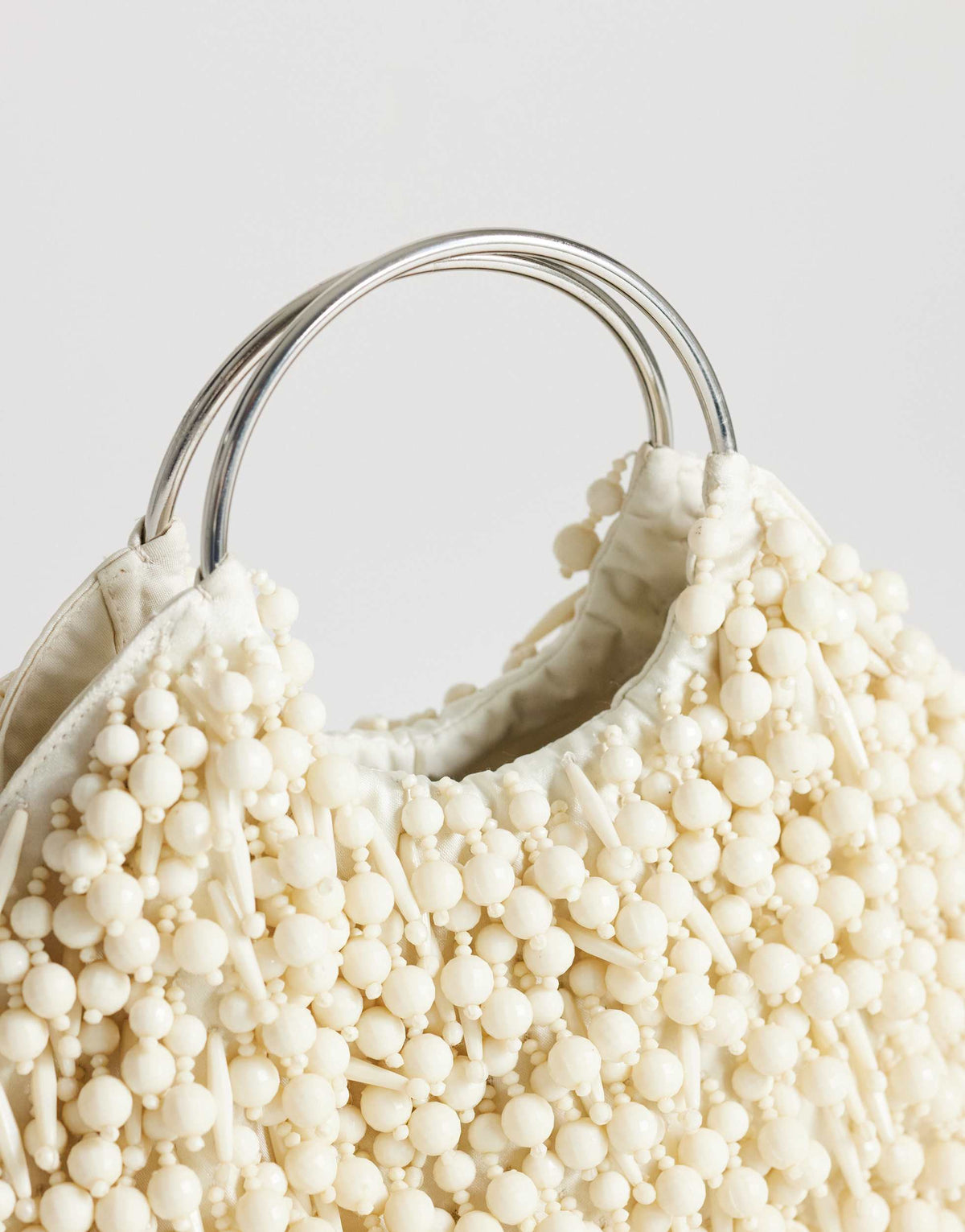 Topshop Hunter bead grab bag with metal handle in ivory