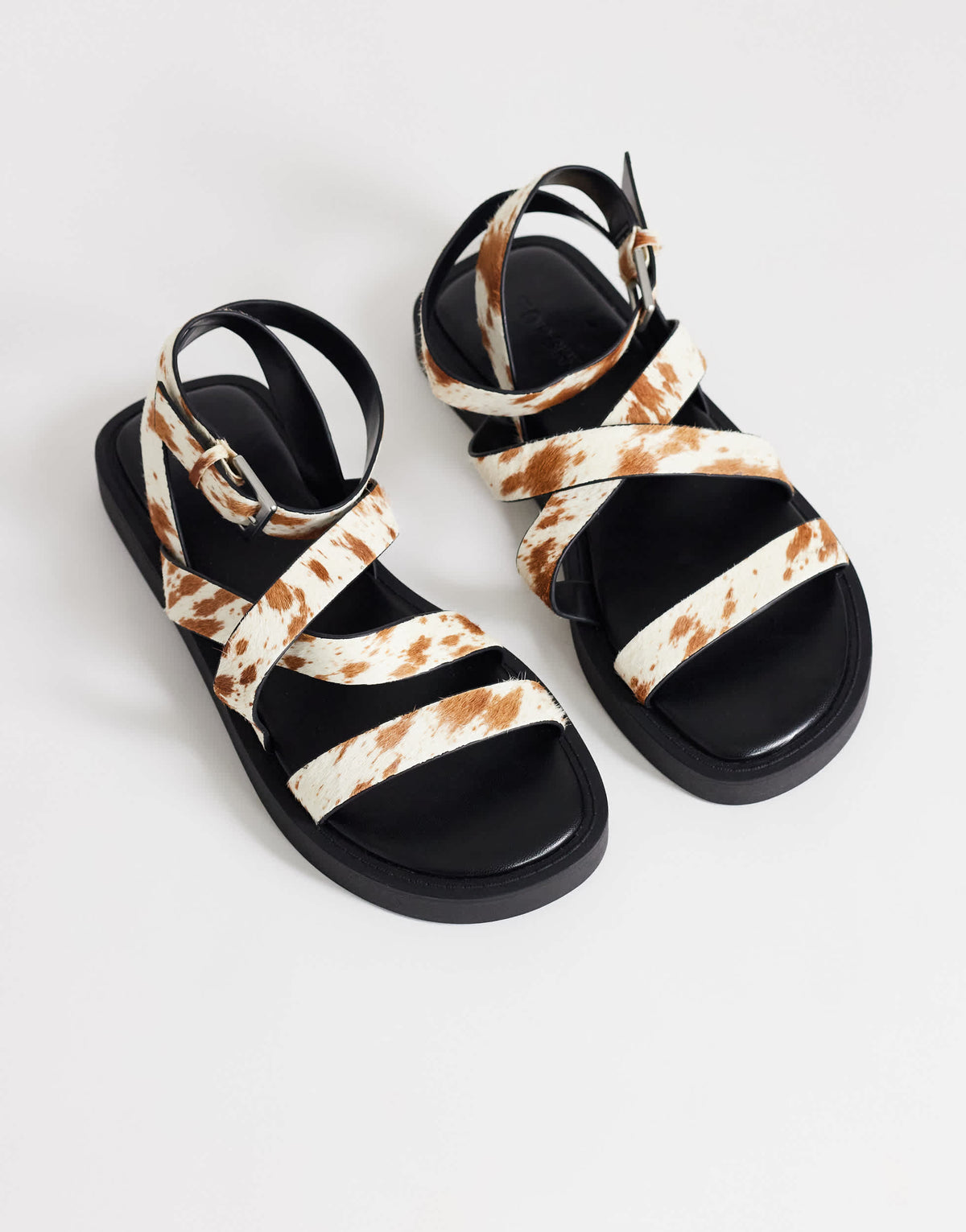 Topshop Sasha strappy flat sandal in cow print hair on real leather
