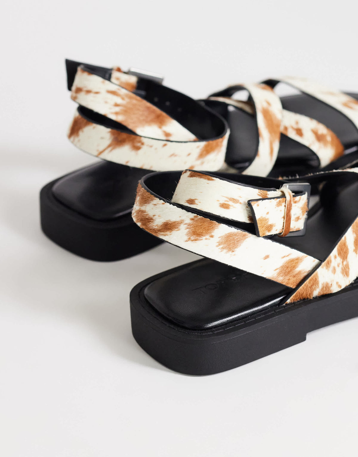 Topshop Sasha strappy flat sandal in cow print hair on real leather