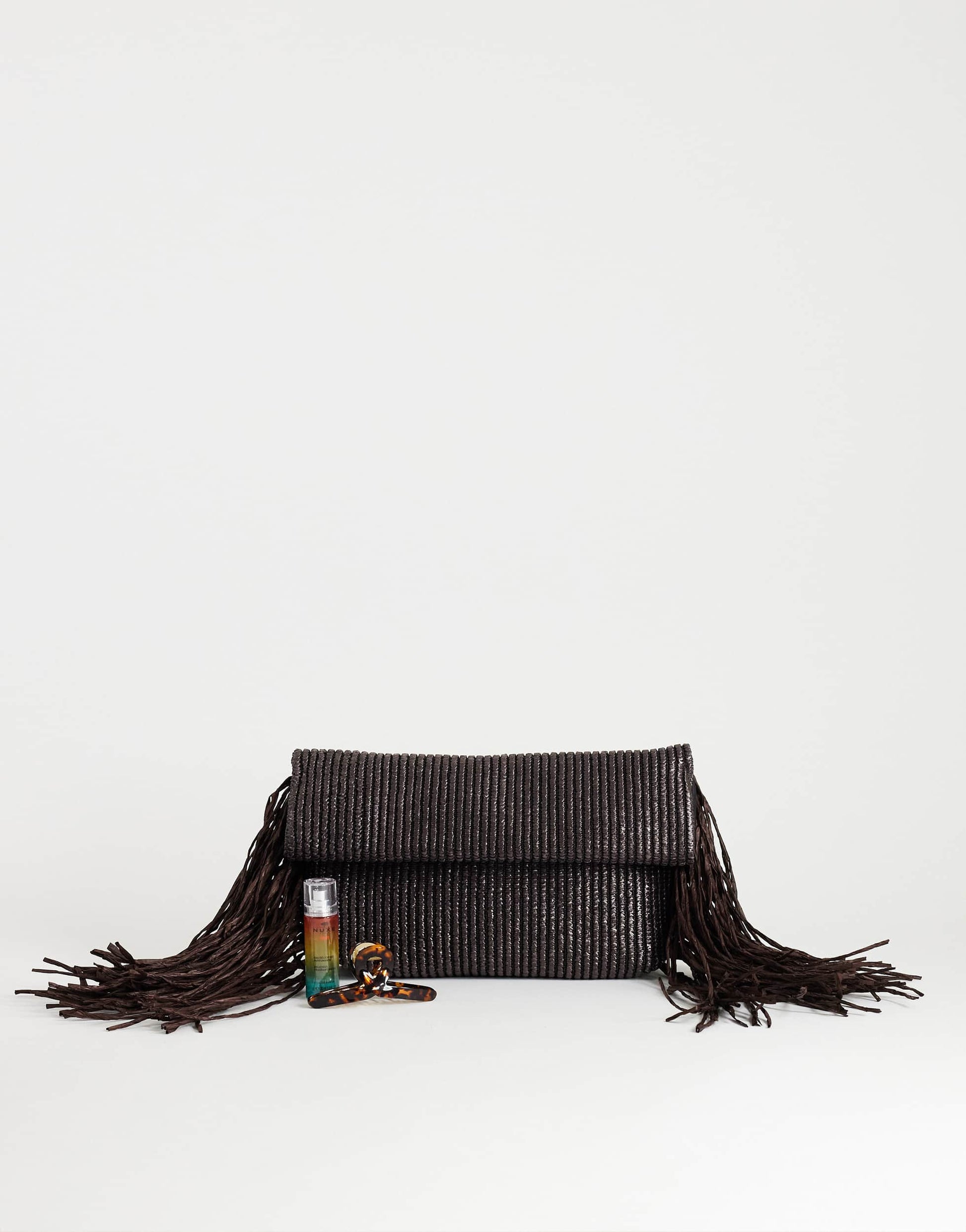 Topshop Tassel oversized weave clutch bag in chocolate