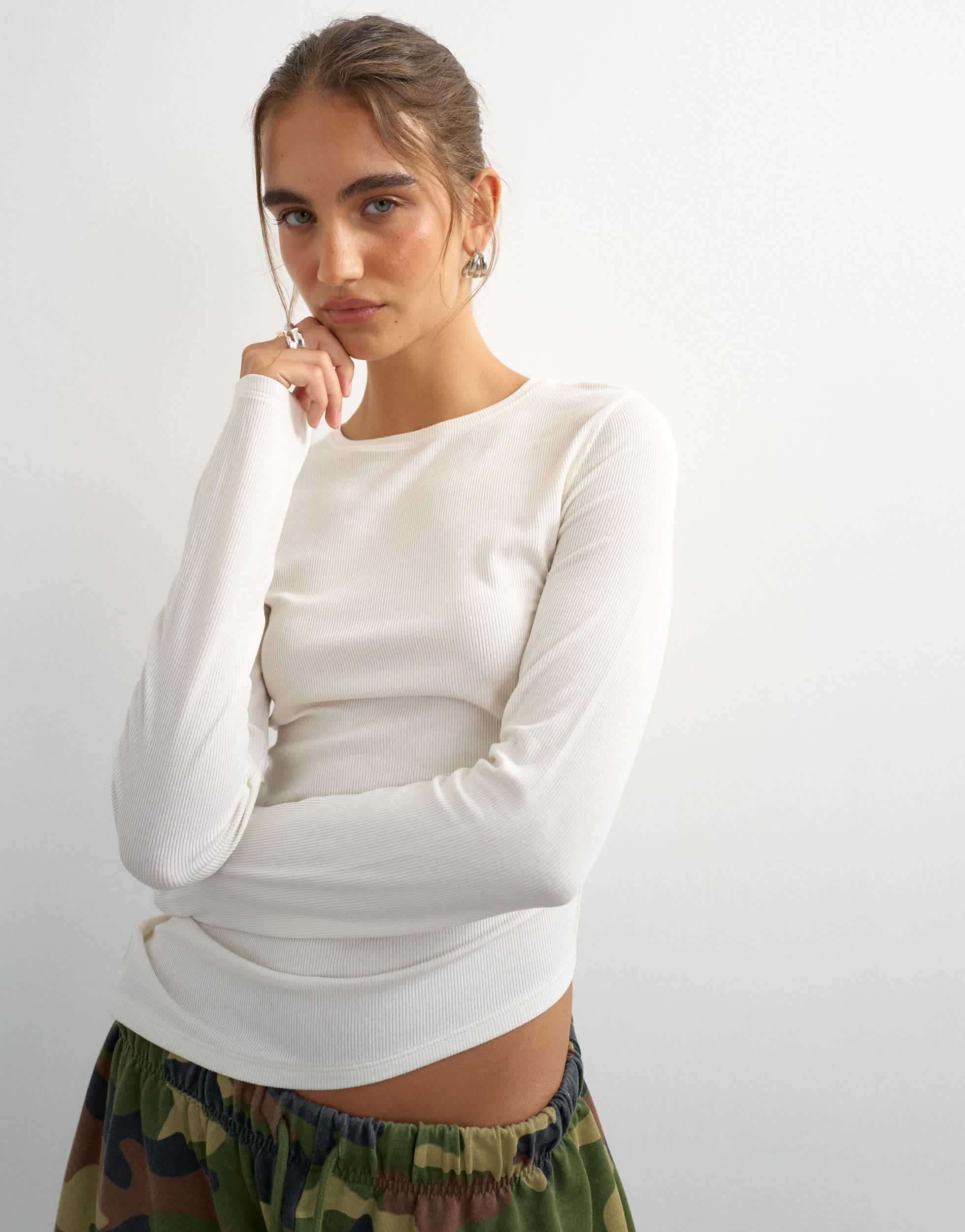 Topshop premium rib ruched asymmetric hem long sleeve top in white