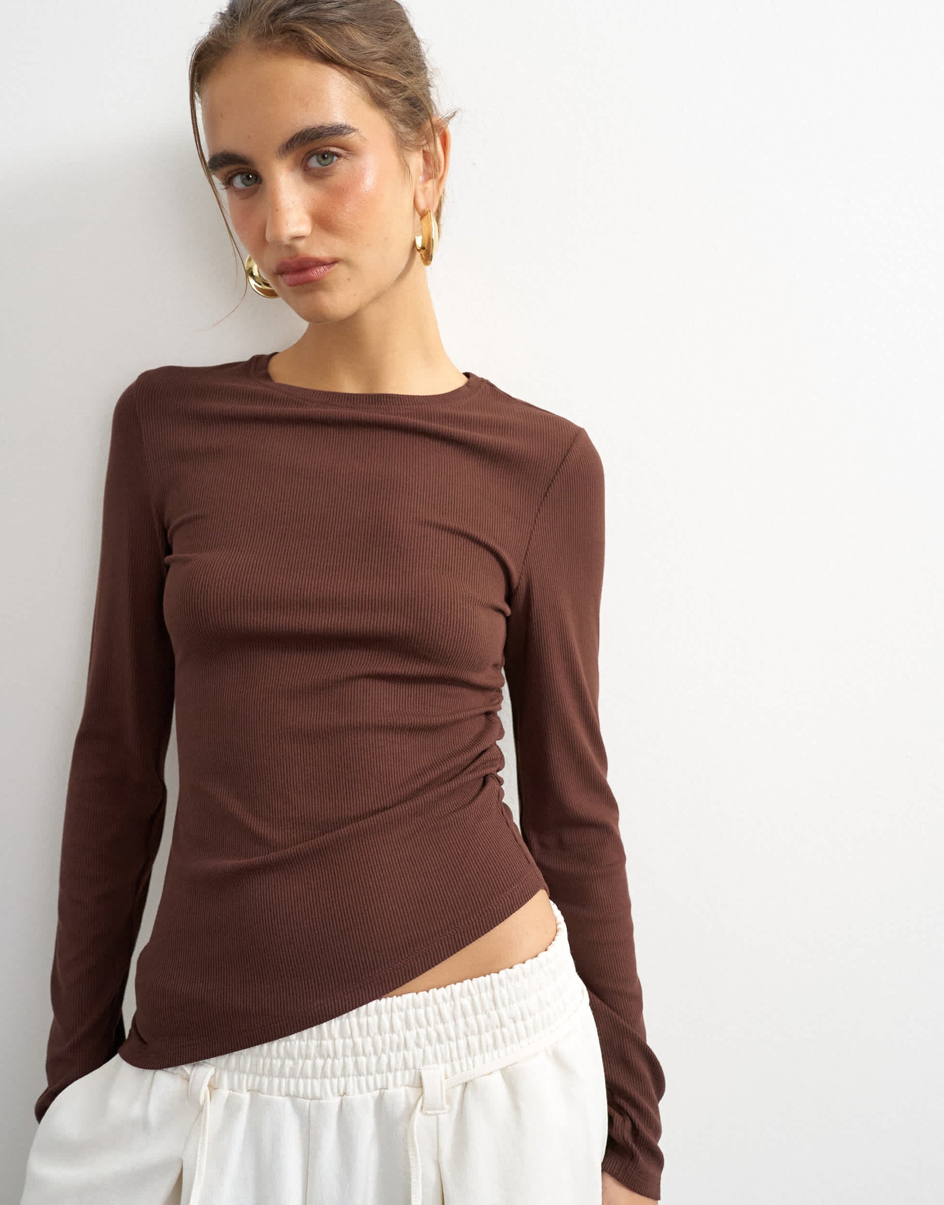 Topshop premium rib ruched asymmetric hem long sleeve top in chocolate