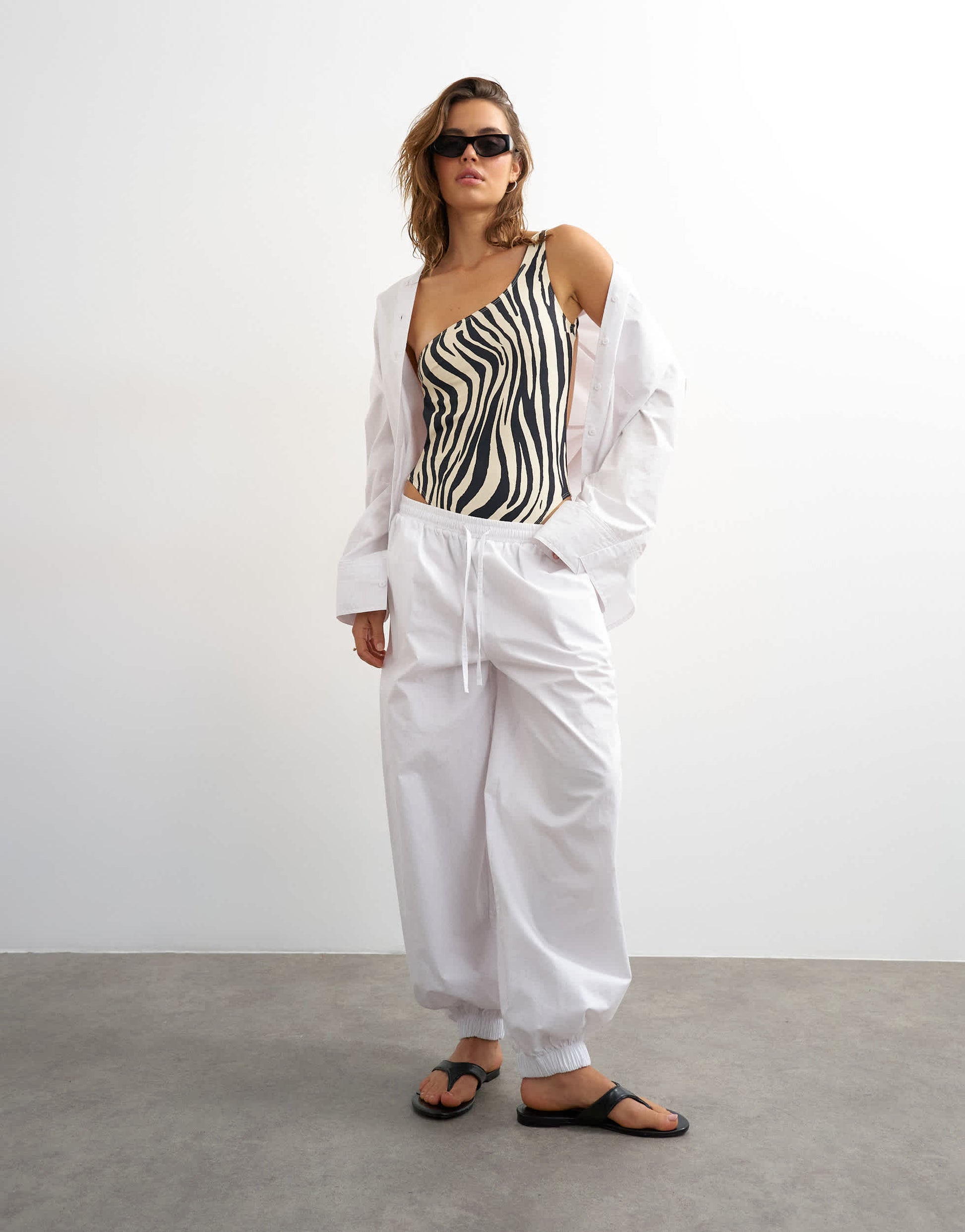 Topshop Arlie asymmetric open back swimsuit in zebra