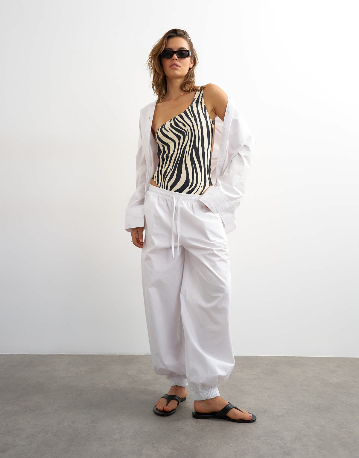 Topshop Arlie asymmetric open back swimsuit in zebra