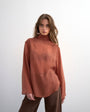 Topshop funnel neck backwards long sleeve shirt in rust