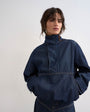 Topshop denim bubble hem top with funnel neck in indigo rinse