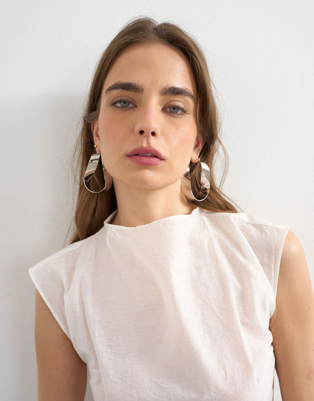 Topshop Charlotte twisted hoop earring in silver tone