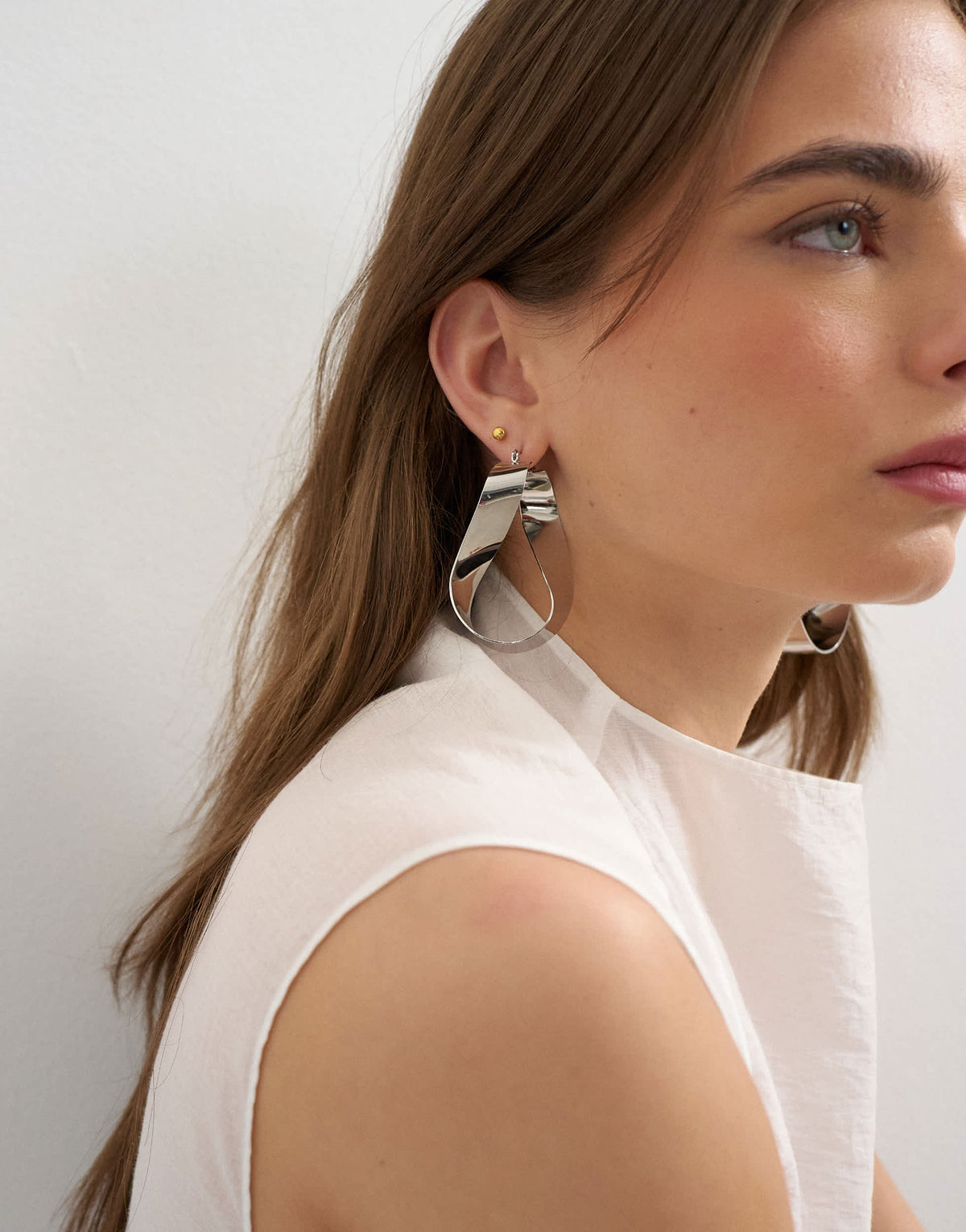 Topshop Charlotte twisted hoop earring in silver tone