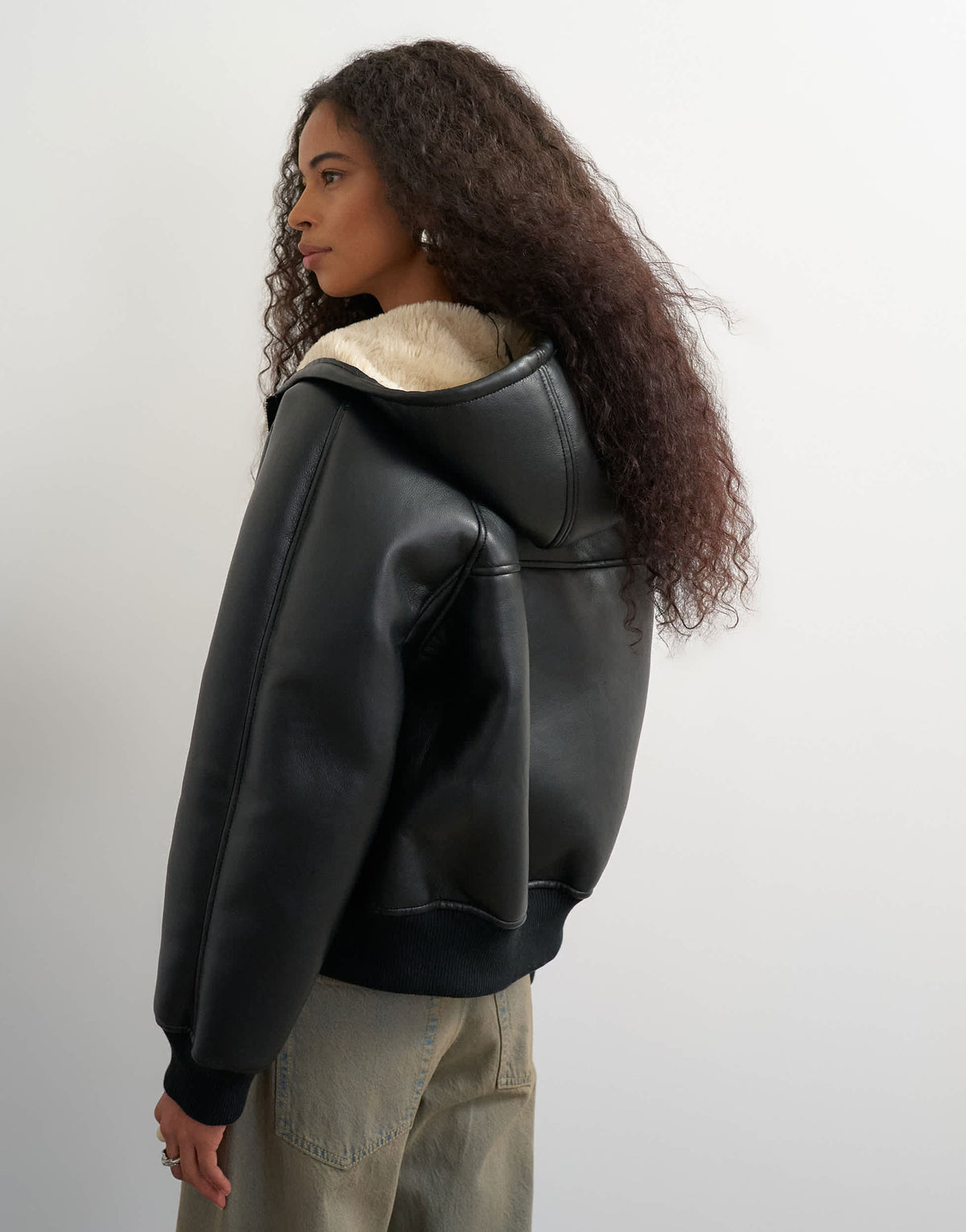 Topshop faux leather hooded shearling bomber jacket in black