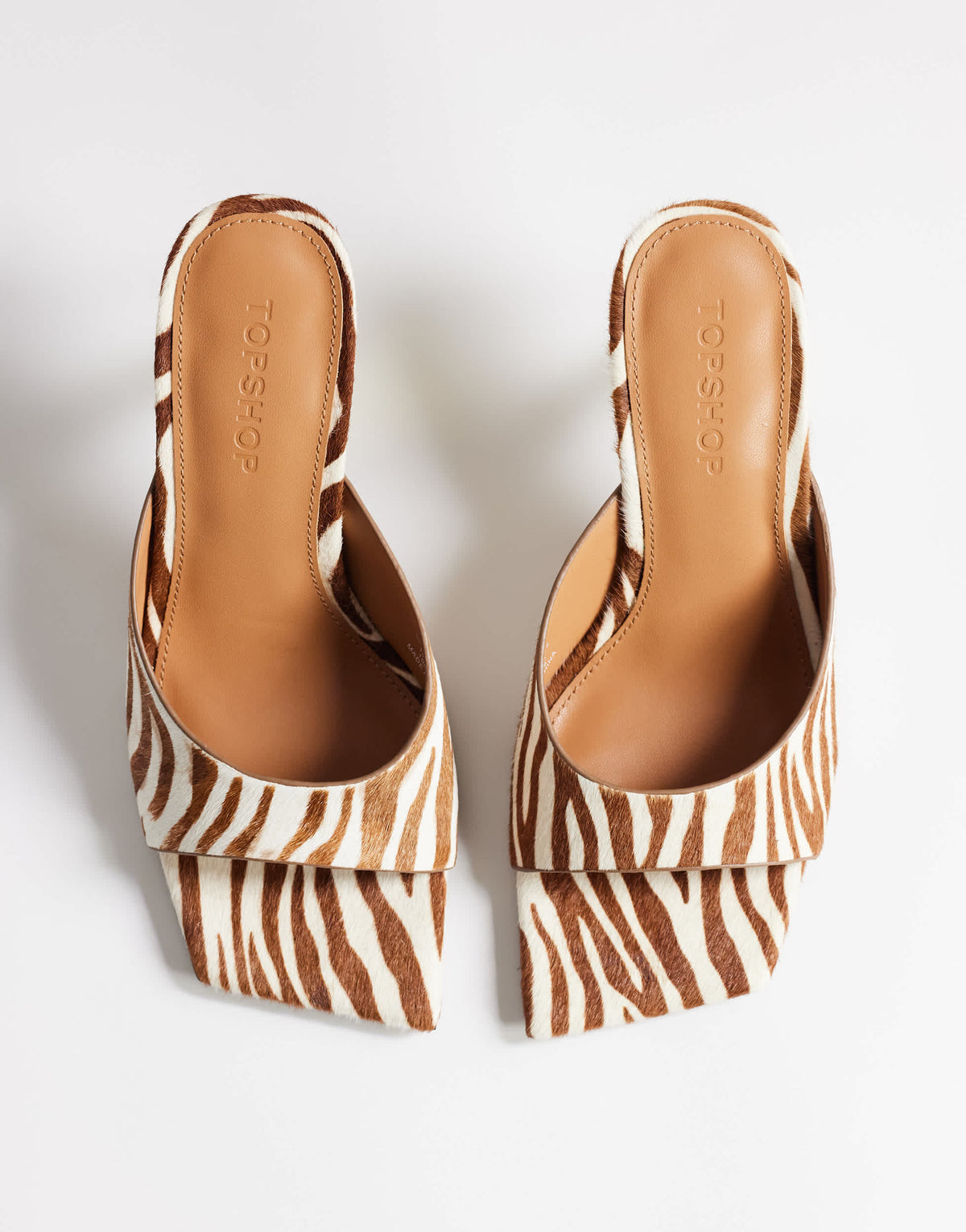 Topshop Nicole angular mid heel mule in zebra print hair on real leather