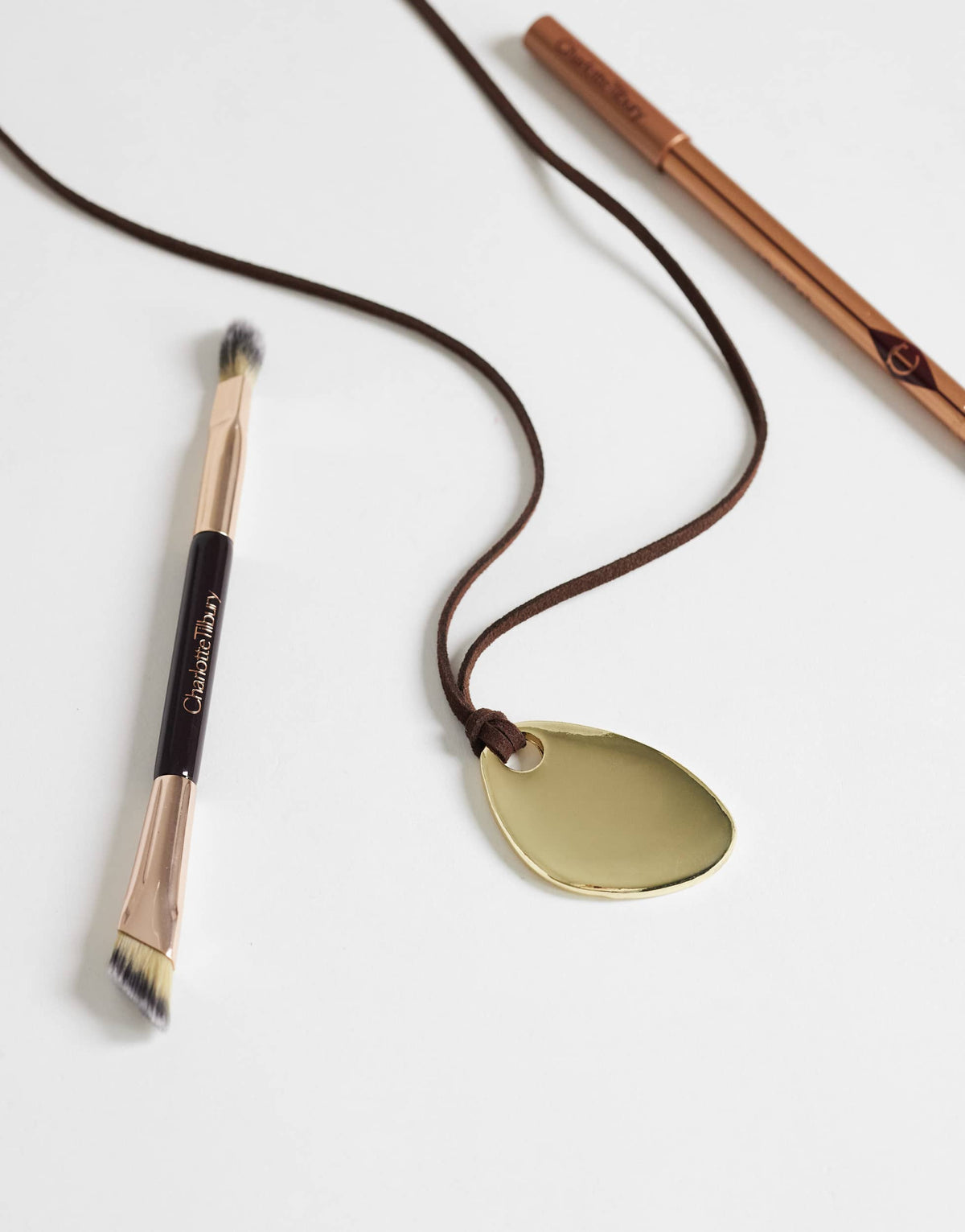 Topshop Leila cord necklace with pendant in gold and brown