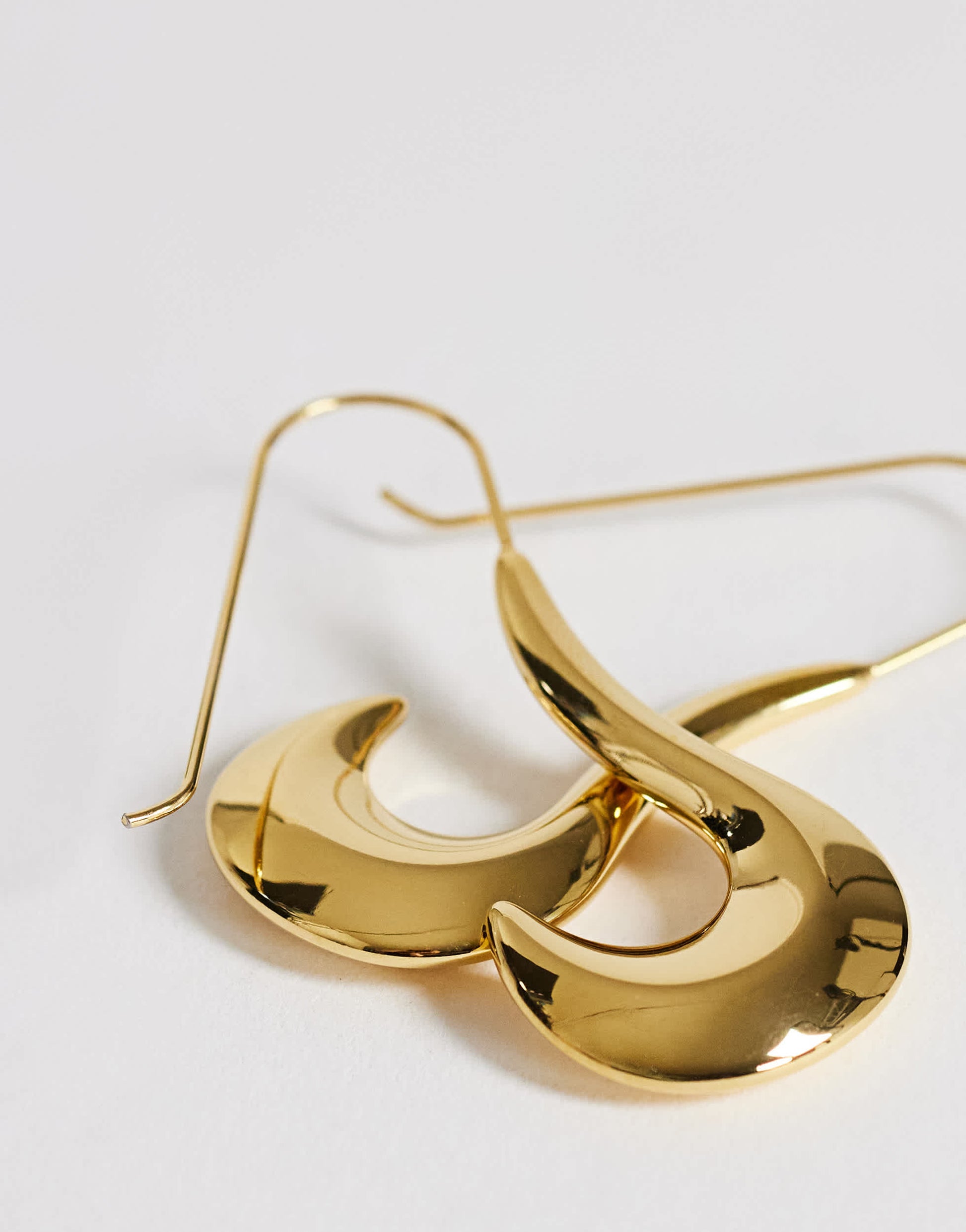 Topshop Claudia waterproof wavy drop hoop earrings in stainless gold
