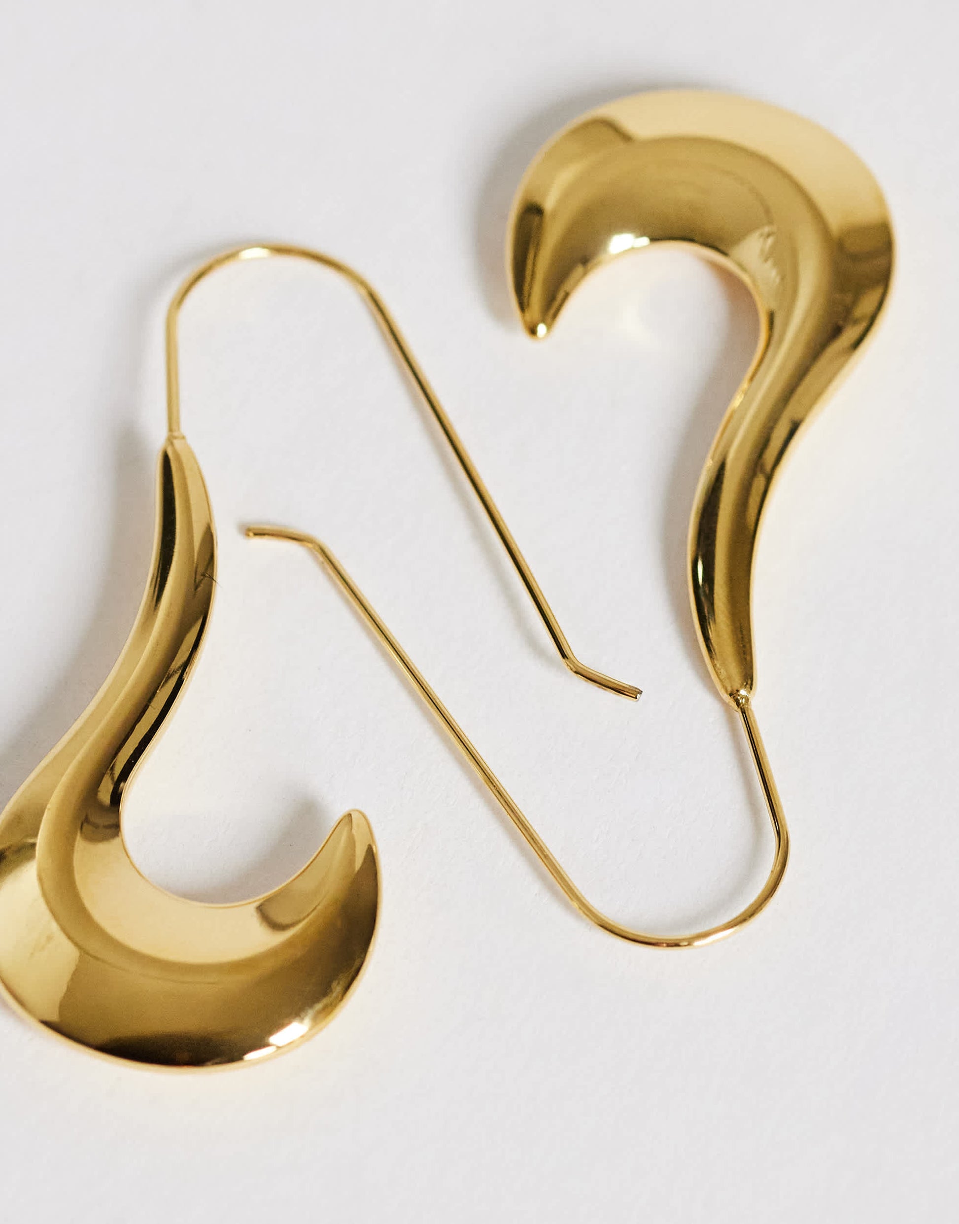 Topshop Claudia waterproof wavy drop hoop earrings in stainless gold