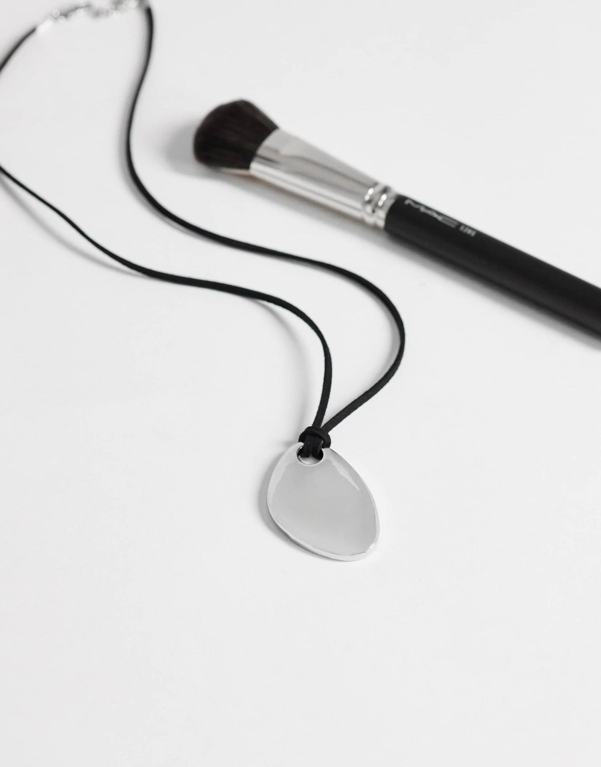 Topshop Leila cord necklace with pendant in silver and black