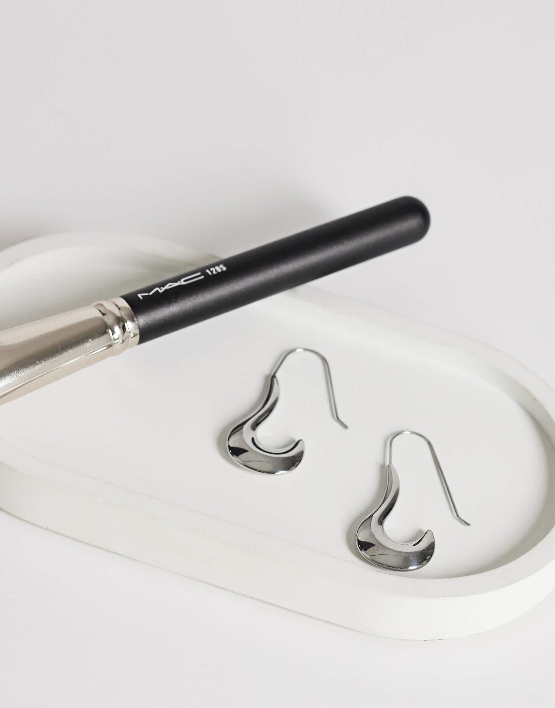 Topshop Claudia waterproof wavy drop hoop earrings in stainless silver