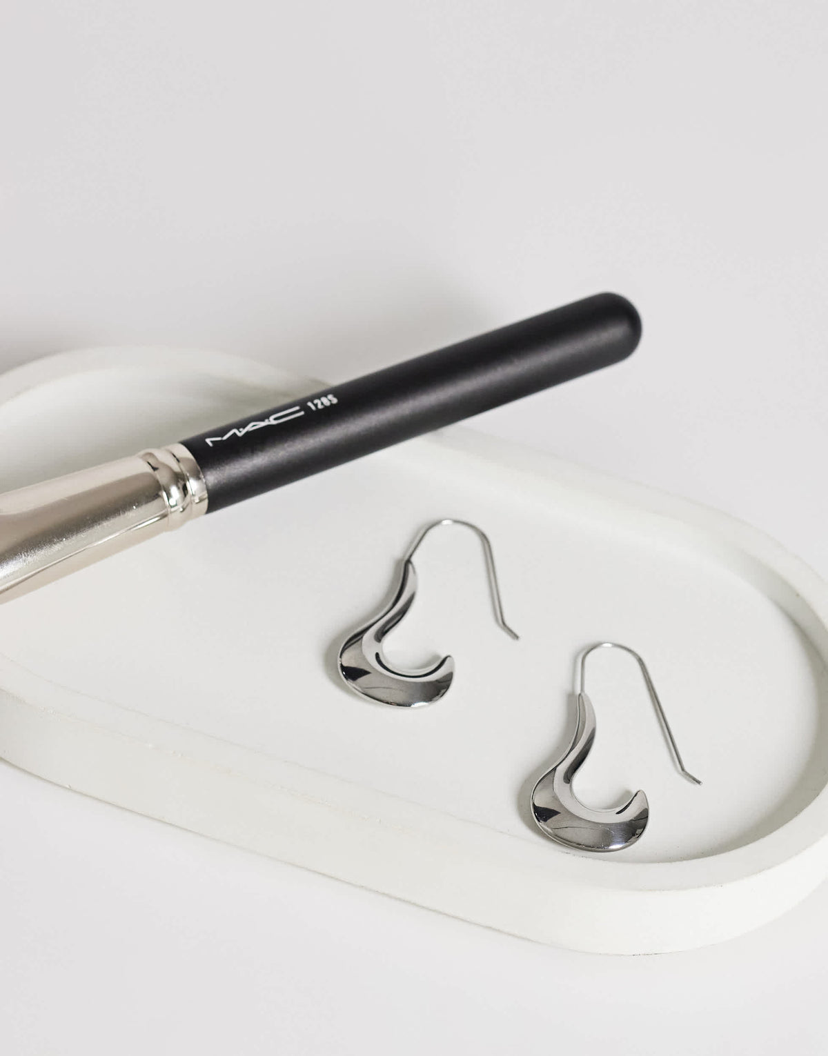 Topshop Claudia waterproof wavy drop hoop earrings in stainless silver
