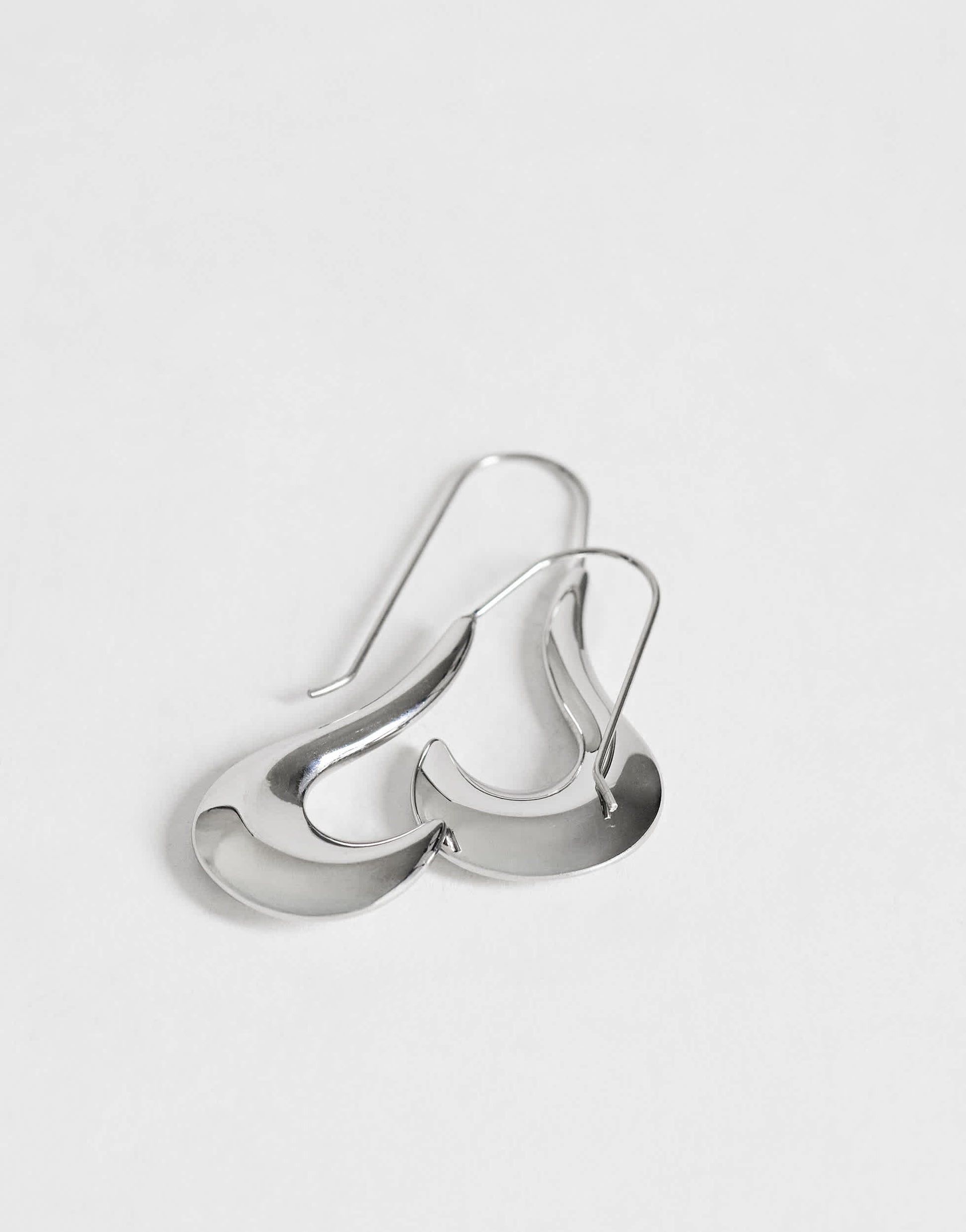 Topshop Claudia waterproof wavy drop hoop earrings in stainless silver