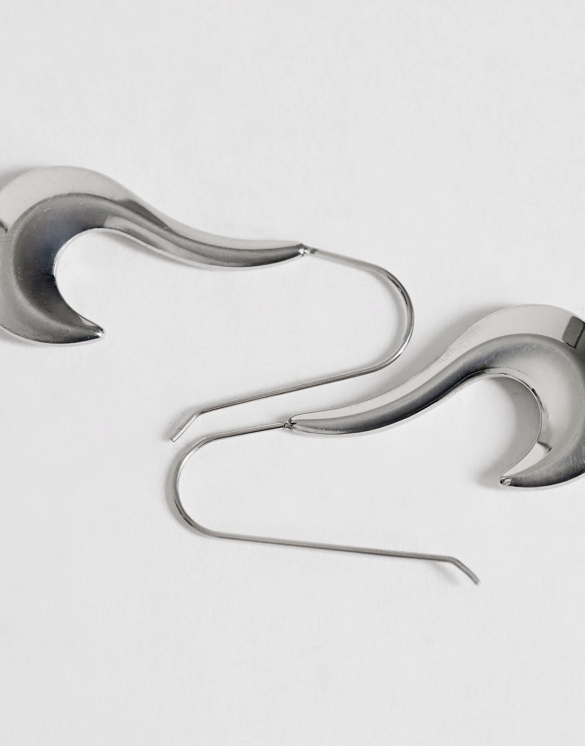 Topshop Claudia waterproof wavy drop hoop earrings in stainless silver